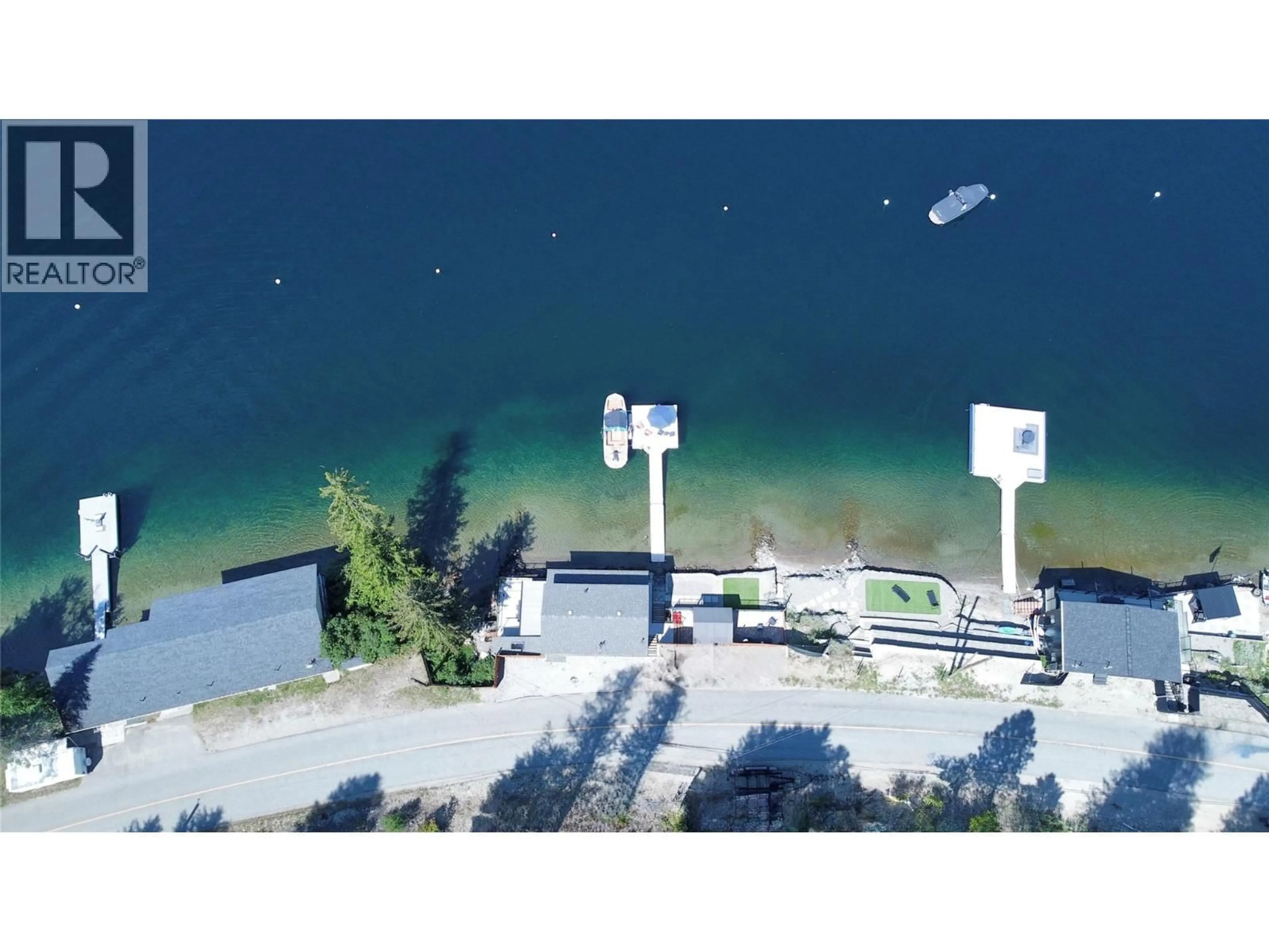 A pic from outside/outdoor area/front of a property/back of a property/a pic from drone, water/lake/river/ocean view for 3109 EAST LAKE DRIVE, Christina Lake British Columbia V0H1E1