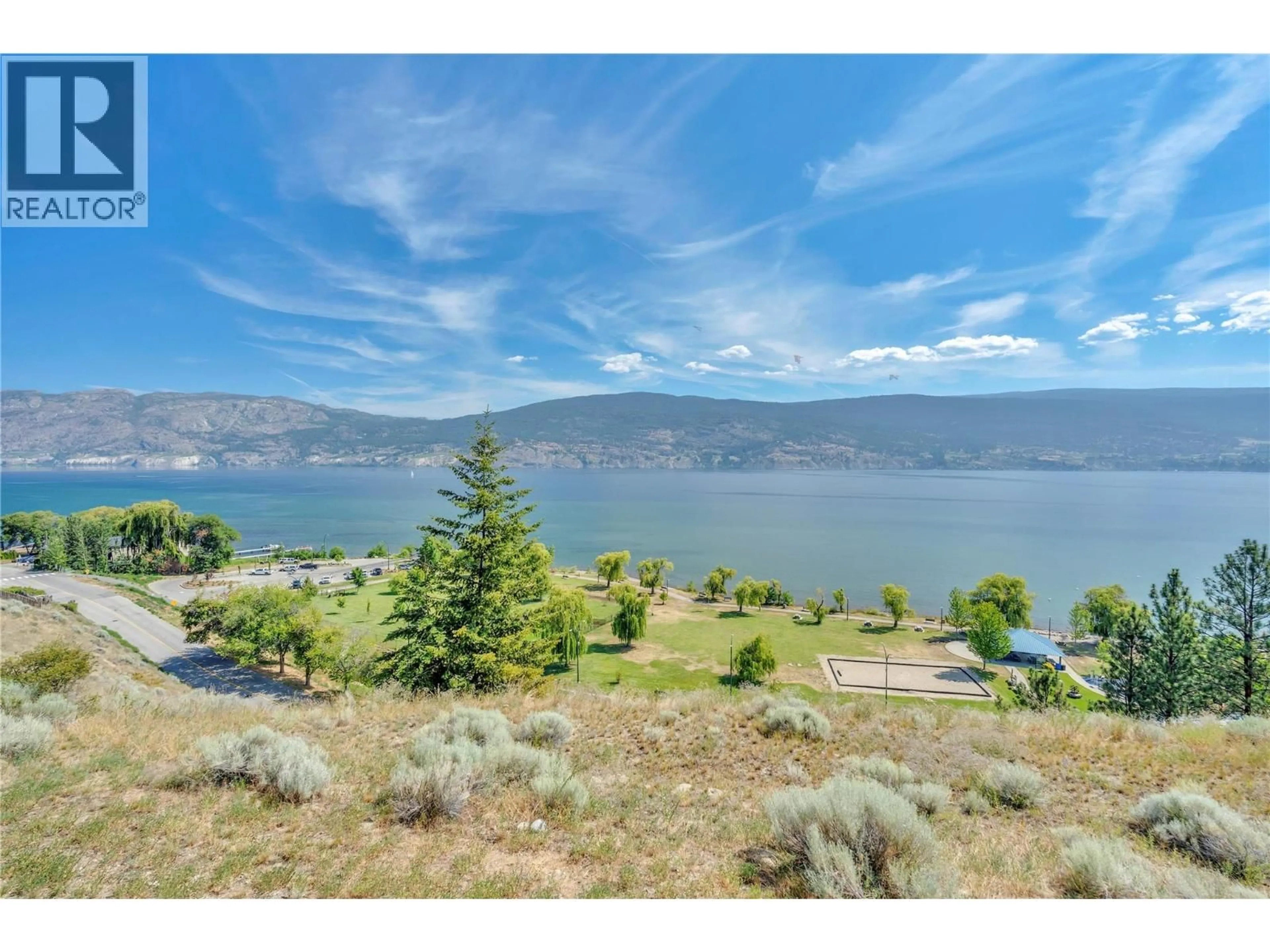 A pic from outside/outdoor area/front of a property/back of a property/a pic from drone, water/lake/river/ocean view for 205 - 14419 DOWNTON AVENUE, Summerland British Columbia V0H1Z1