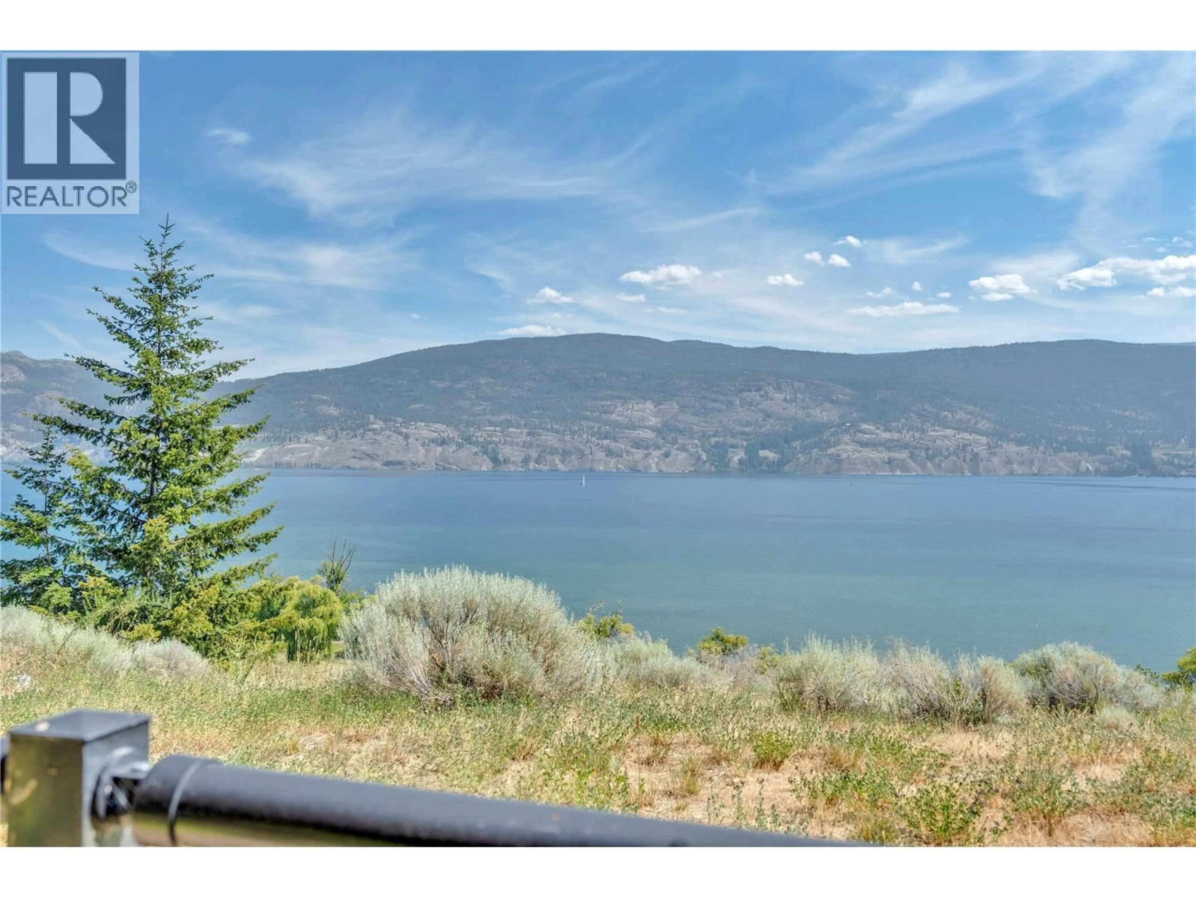 A pic from outside/outdoor area/front of a property/back of a property/a pic from drone, water/lake/river/ocean view for 205 - 14419 DOWNTON AVENUE, Summerland British Columbia V0H1Z1