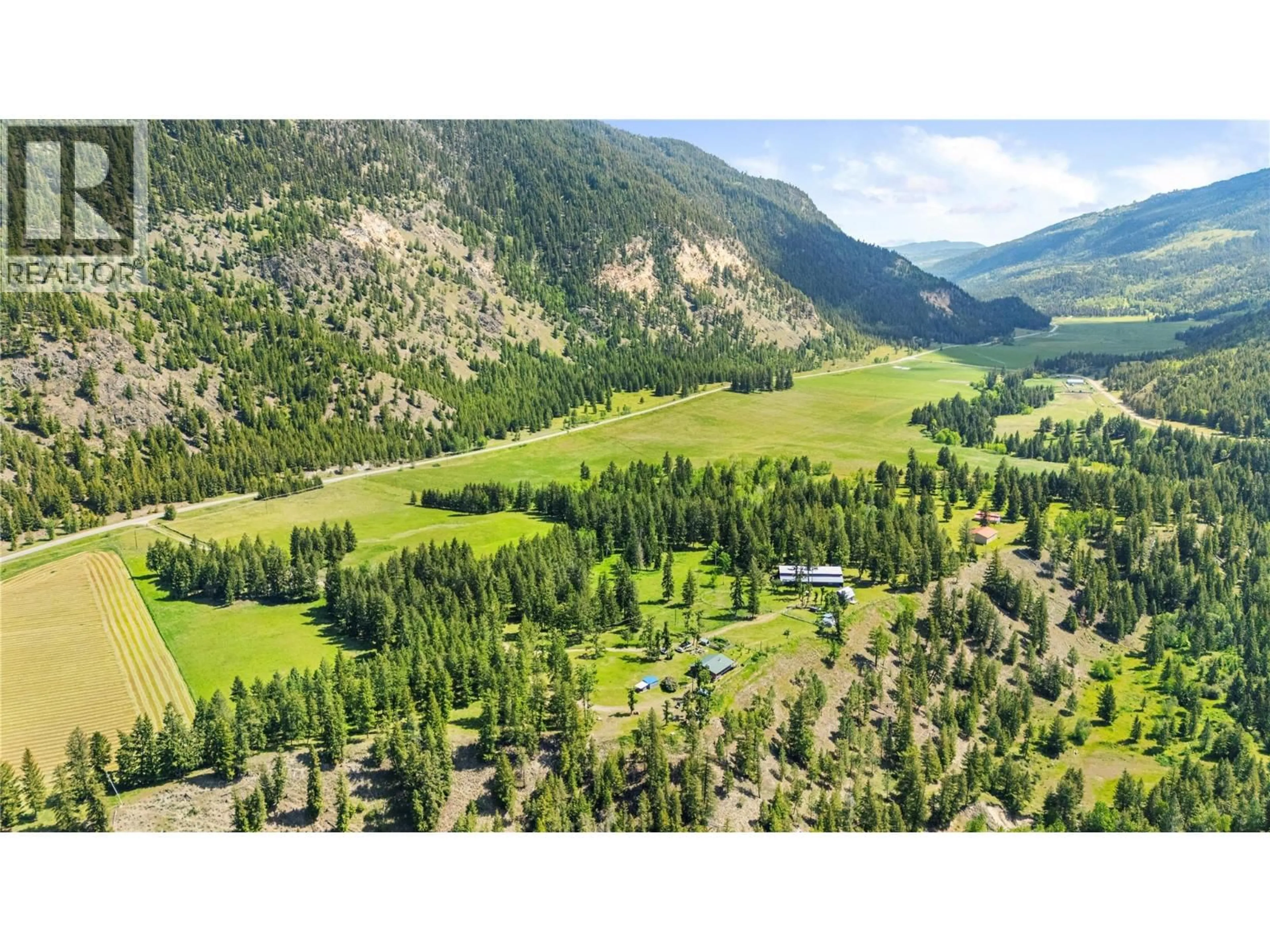 A pic from outside/outdoor area/front of a property/back of a property/a pic from drone, mountain view for 2673 AGATE BAY ROAD, Barriere British Columbia V0E2E0