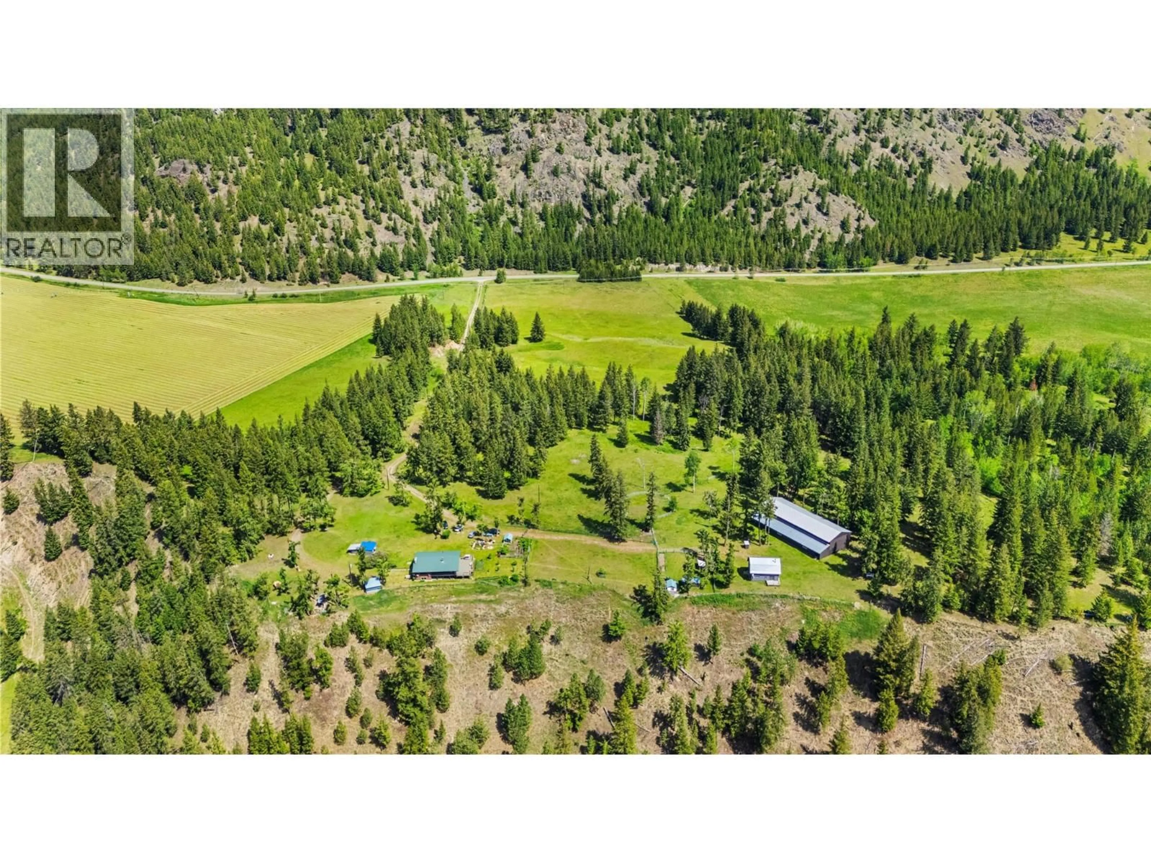 A pic from outside/outdoor area/front of a property/back of a property/a pic from drone, forest/trees view for 2673 AGATE BAY ROAD, Barriere British Columbia V0E2E0