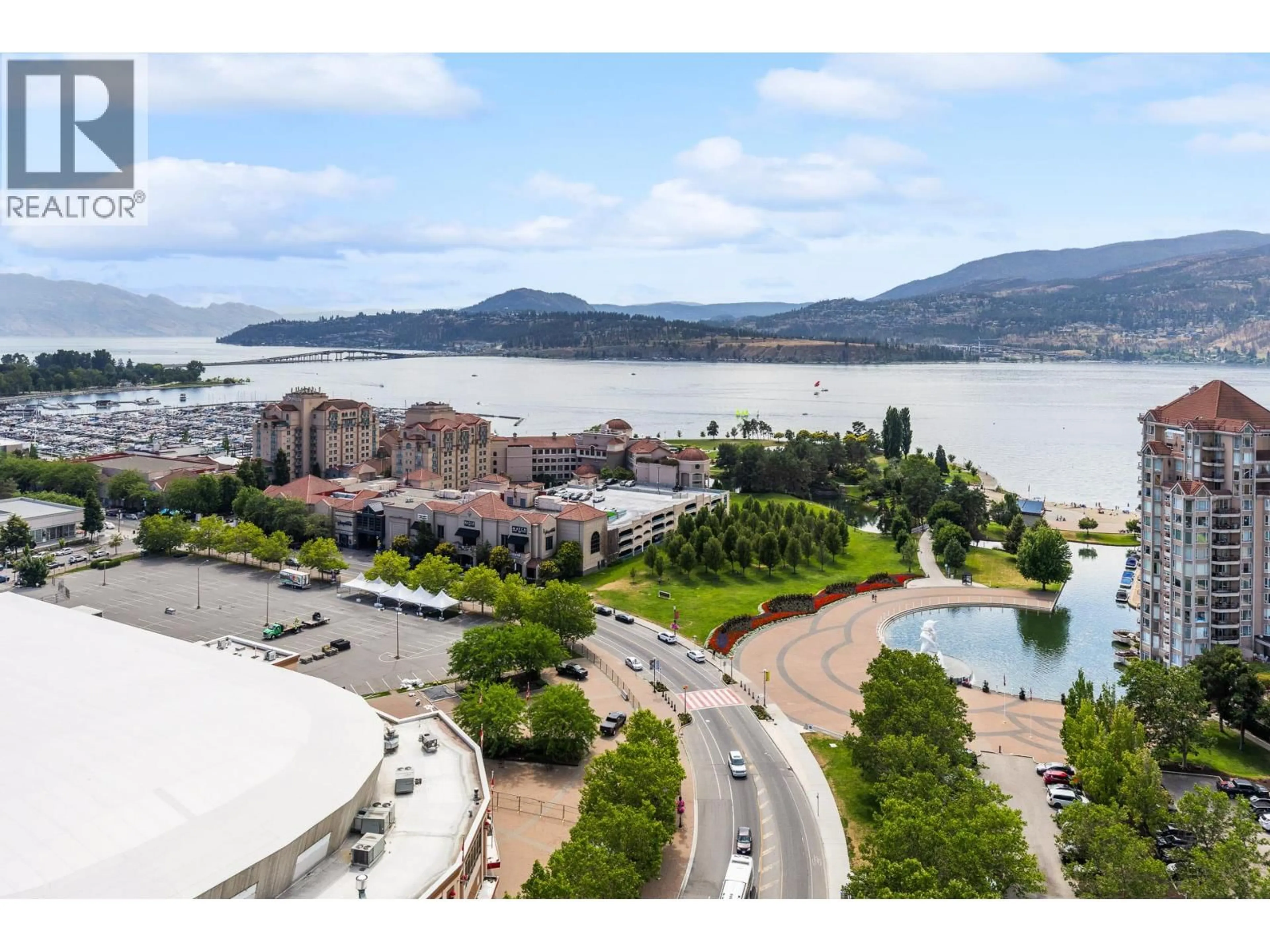 A pic from outside/outdoor area/front of a property/back of a property/a pic from drone, water/lake/river/ocean view for 1904 - 1191 SUNSET DRIVE, Kelowna British Columbia V1Y0J4
