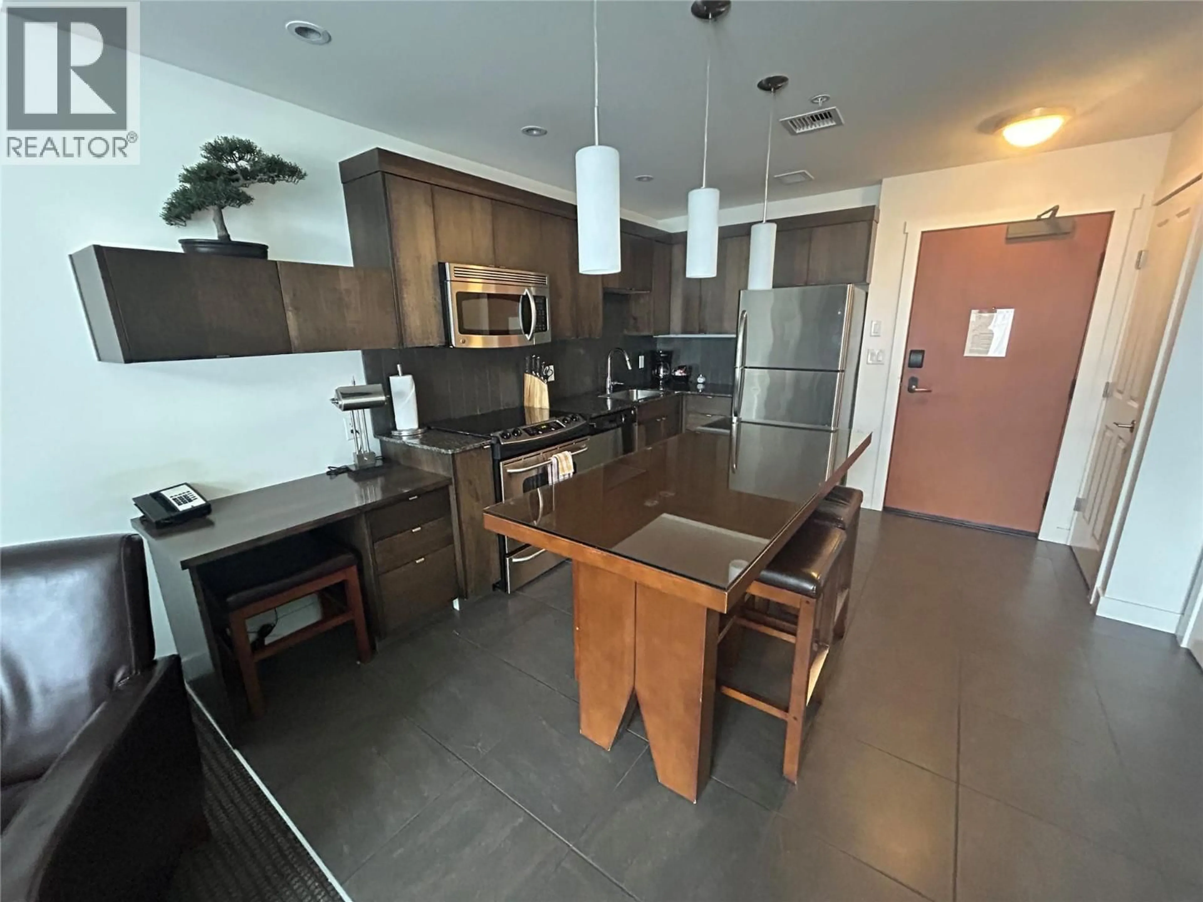 Open concept kitchen, ceramic/tile floor for 413 - 400 STEMWINDER DRIVE, Kimberley British Columbia V1A3E9