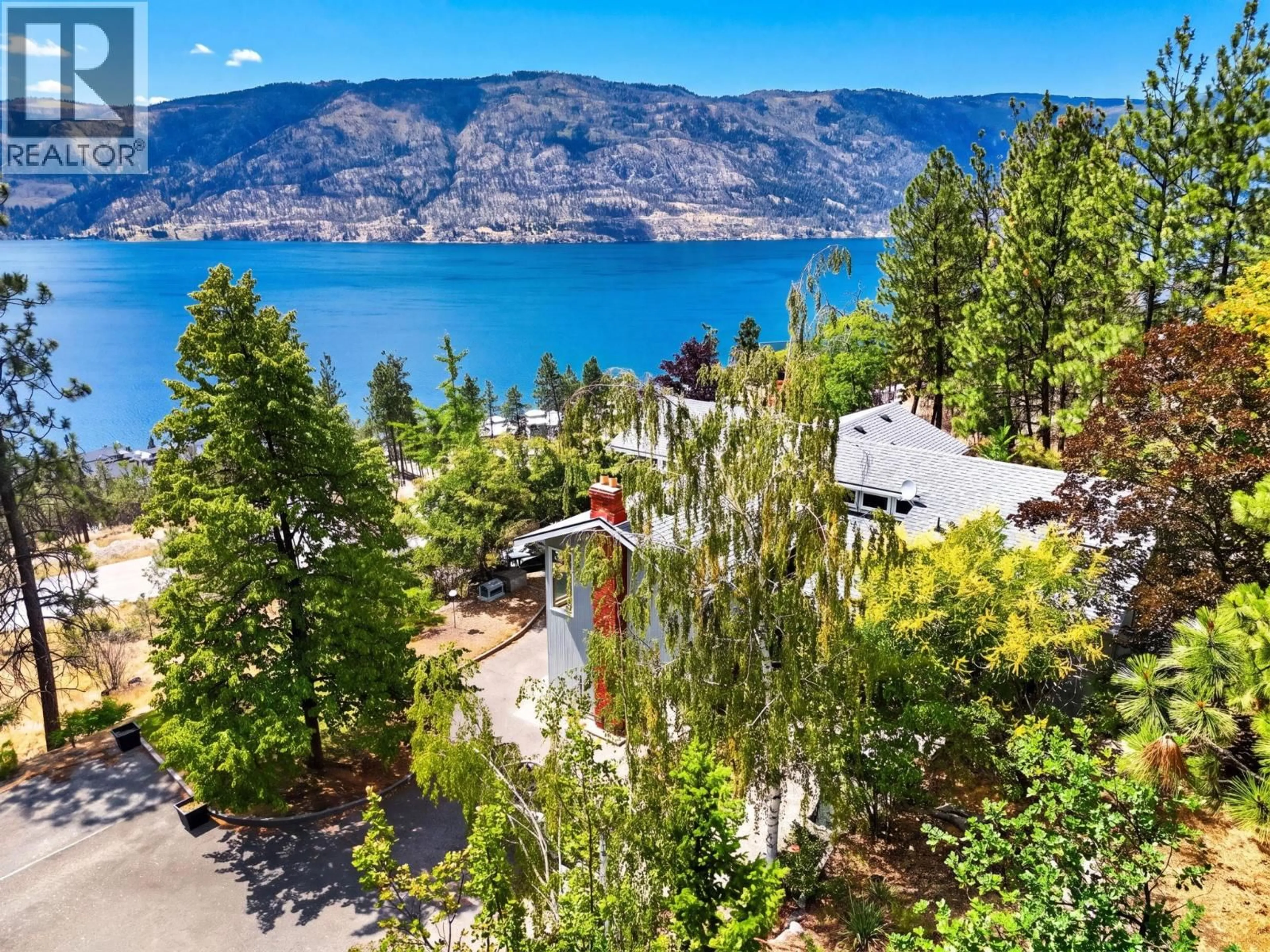 A pic from outside/outdoor area/front of a property/back of a property/a pic from drone, water/lake/river/ocean view for 9251 TYNDALL ROAD, Lake Country British Columbia V4V1N3
