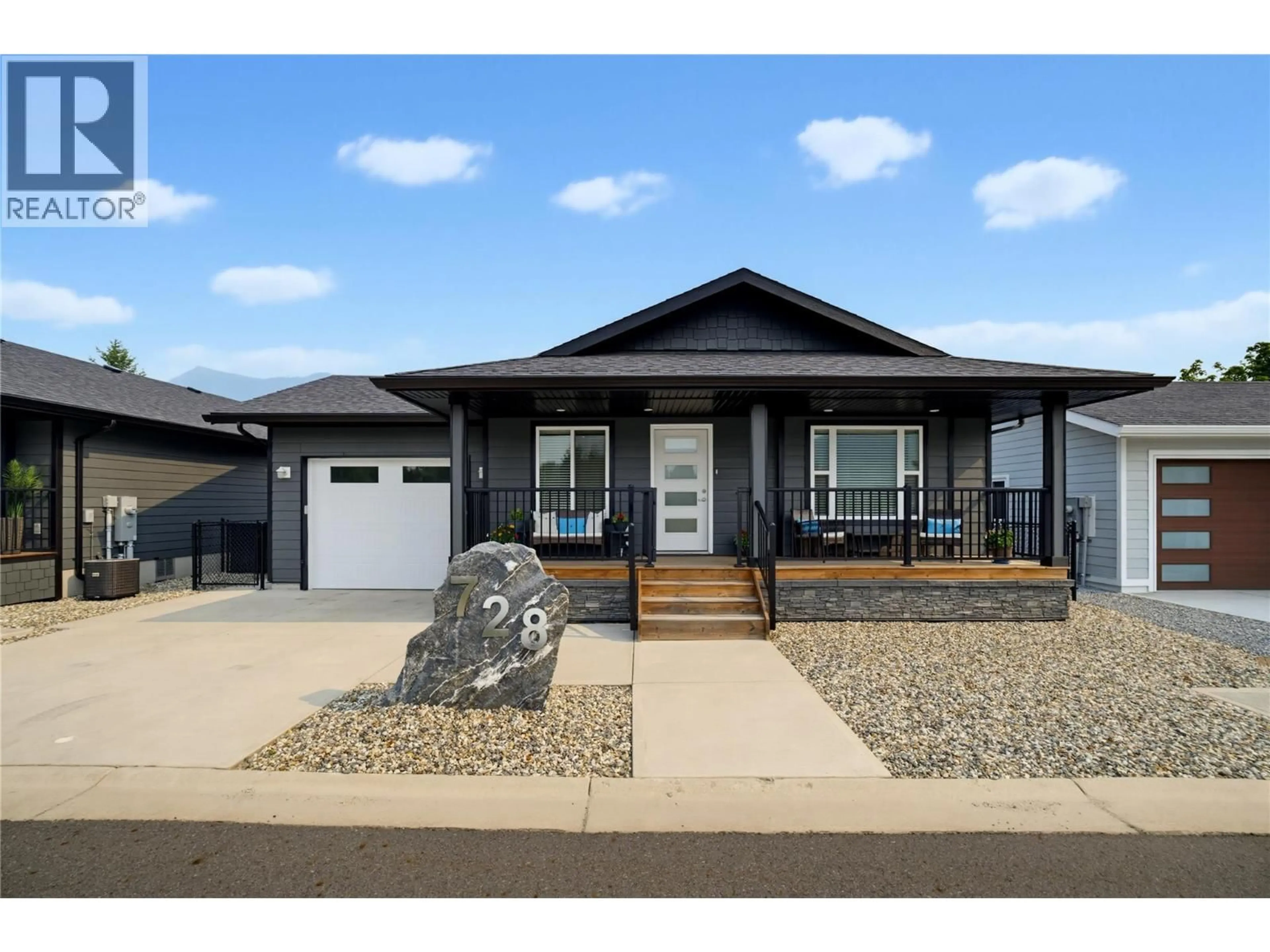 Home with vinyl exterior material, street for 728 ELDERBERRY WALK, Sicamous British Columbia V0E2V0