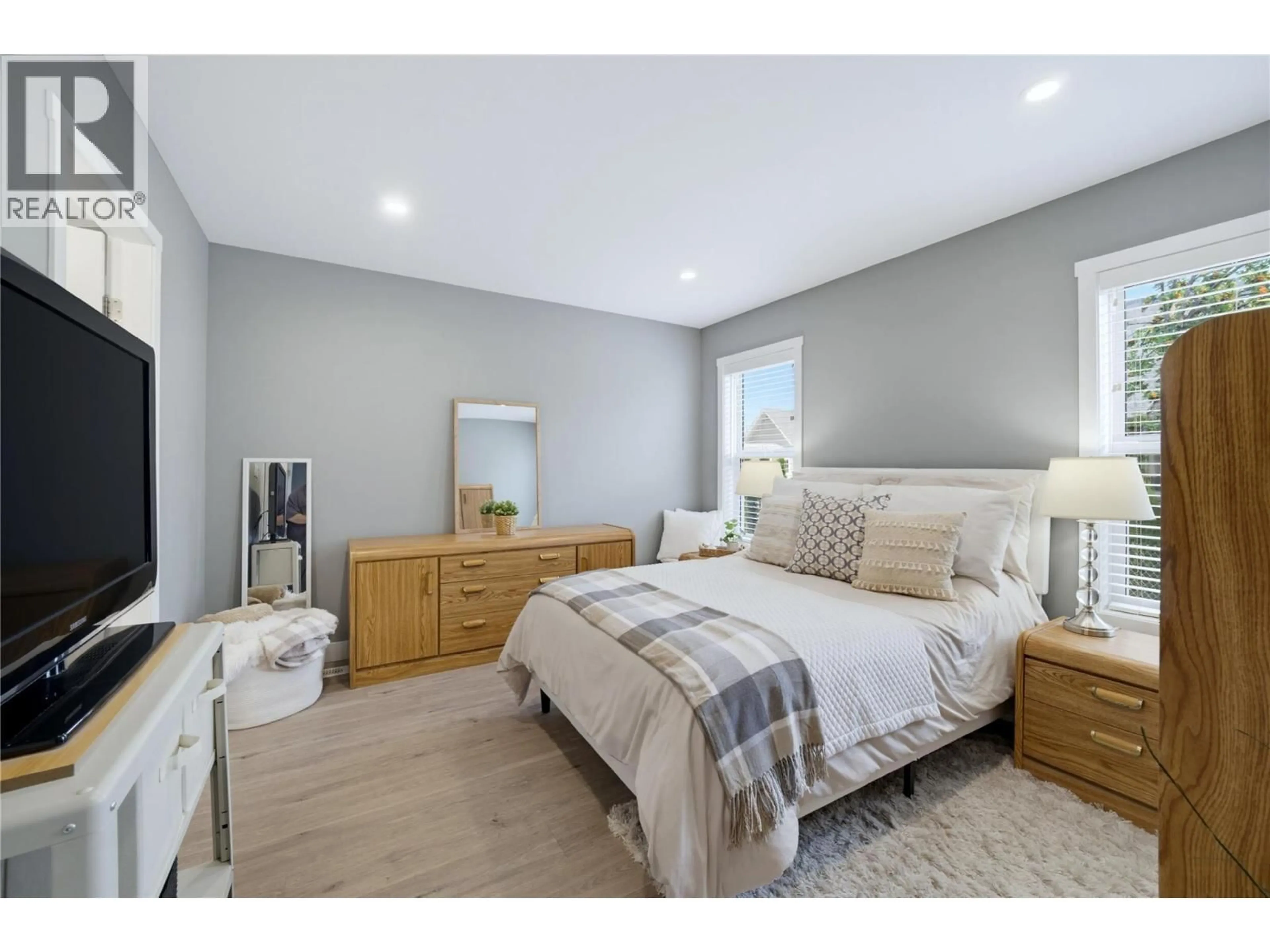 Bedroom with bed, wood/laminate floor for 728 ELDERBERRY WALK, Sicamous British Columbia V0E2V0
