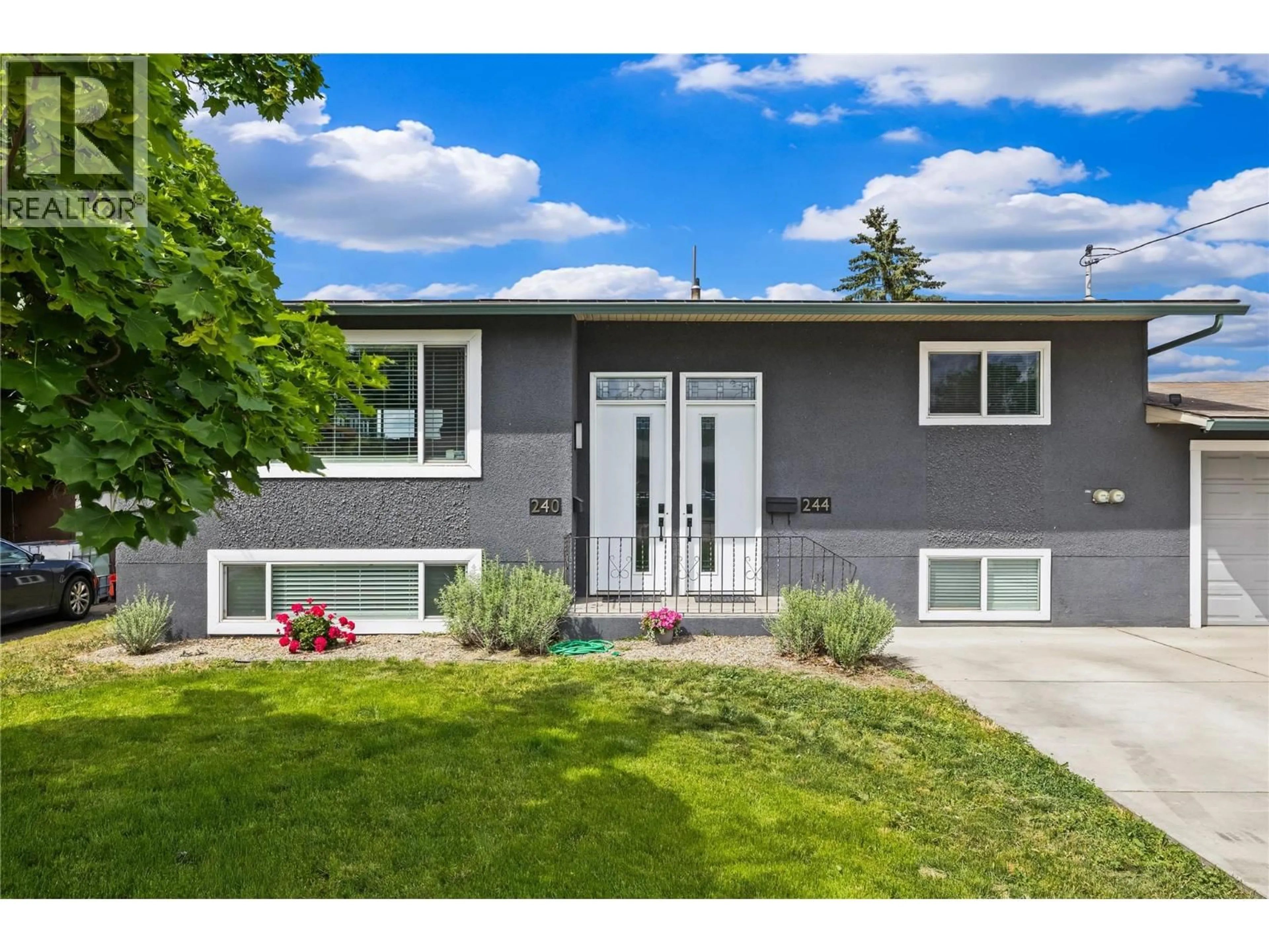 Home with vinyl exterior material, street for 240 BACH ROAD, Kelowna British Columbia V1X2K6