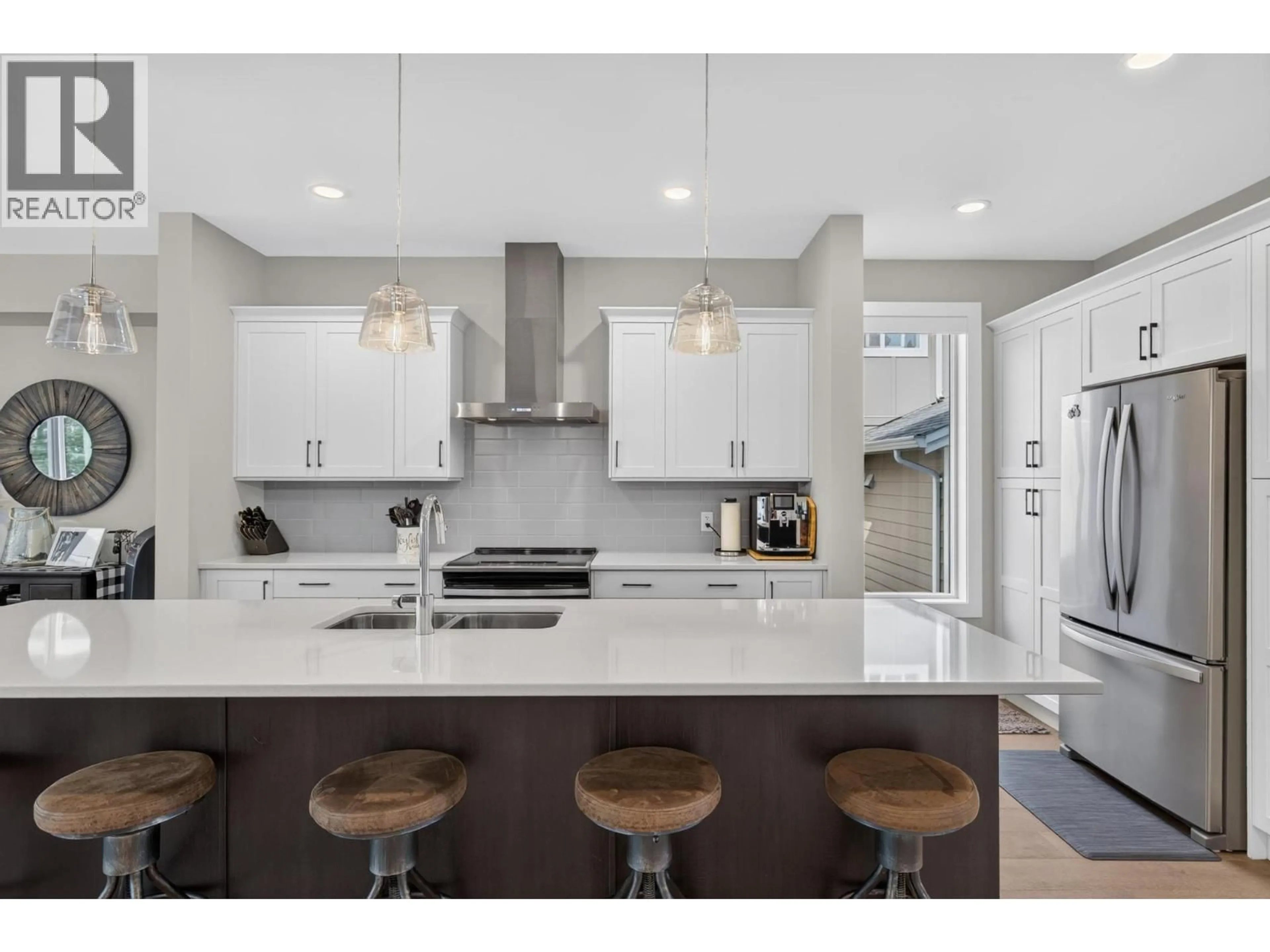 Open concept kitchen, ceramic/tile floor for 4649 RAYMER ROAD, Kelowna British Columbia V1W1J4
