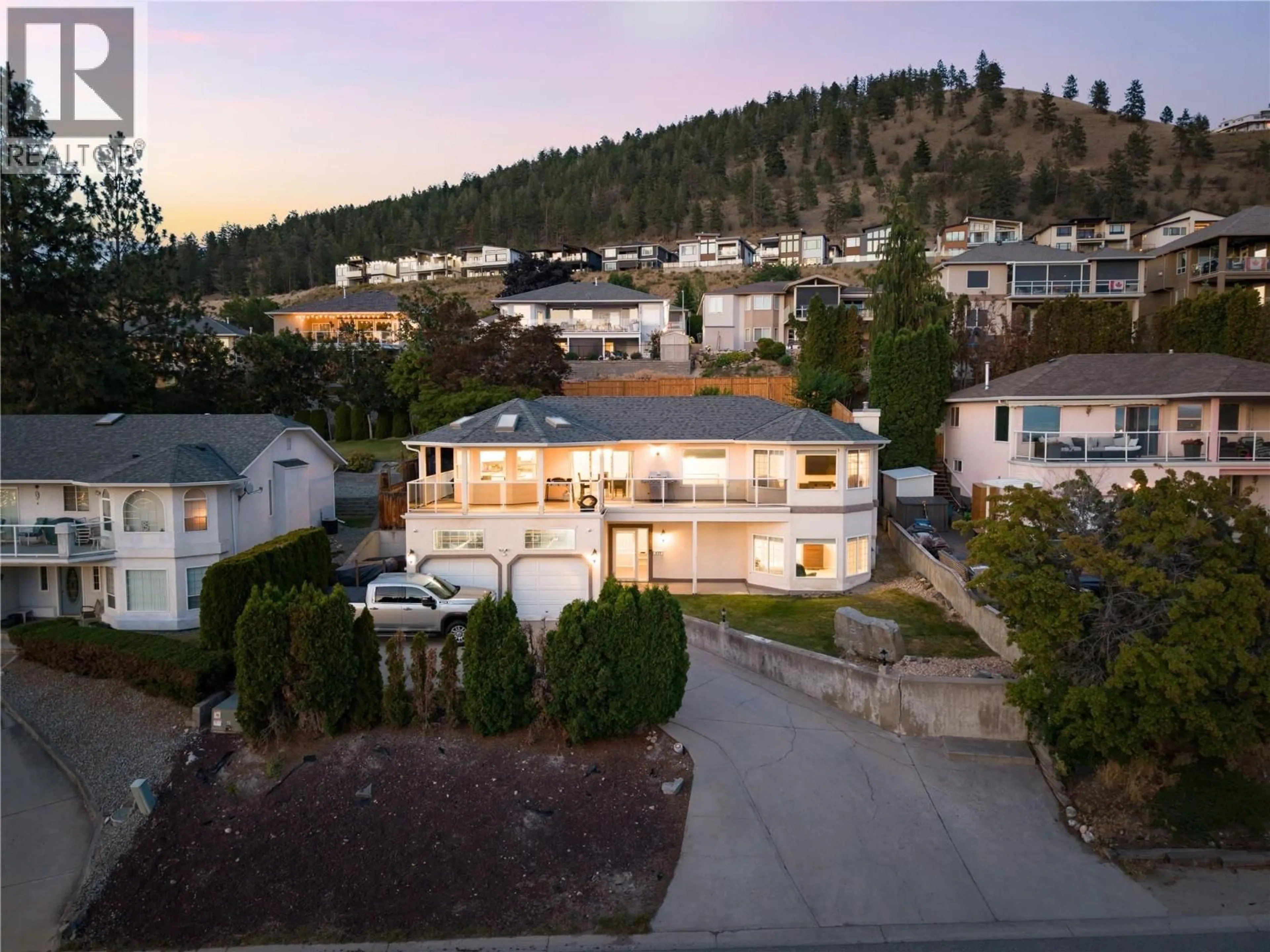 A pic from outside/outdoor area/front of a property/back of a property/a pic from drone, mountain view for 877 TOOVEY ROAD, Kelowna British Columbia V1X6R2