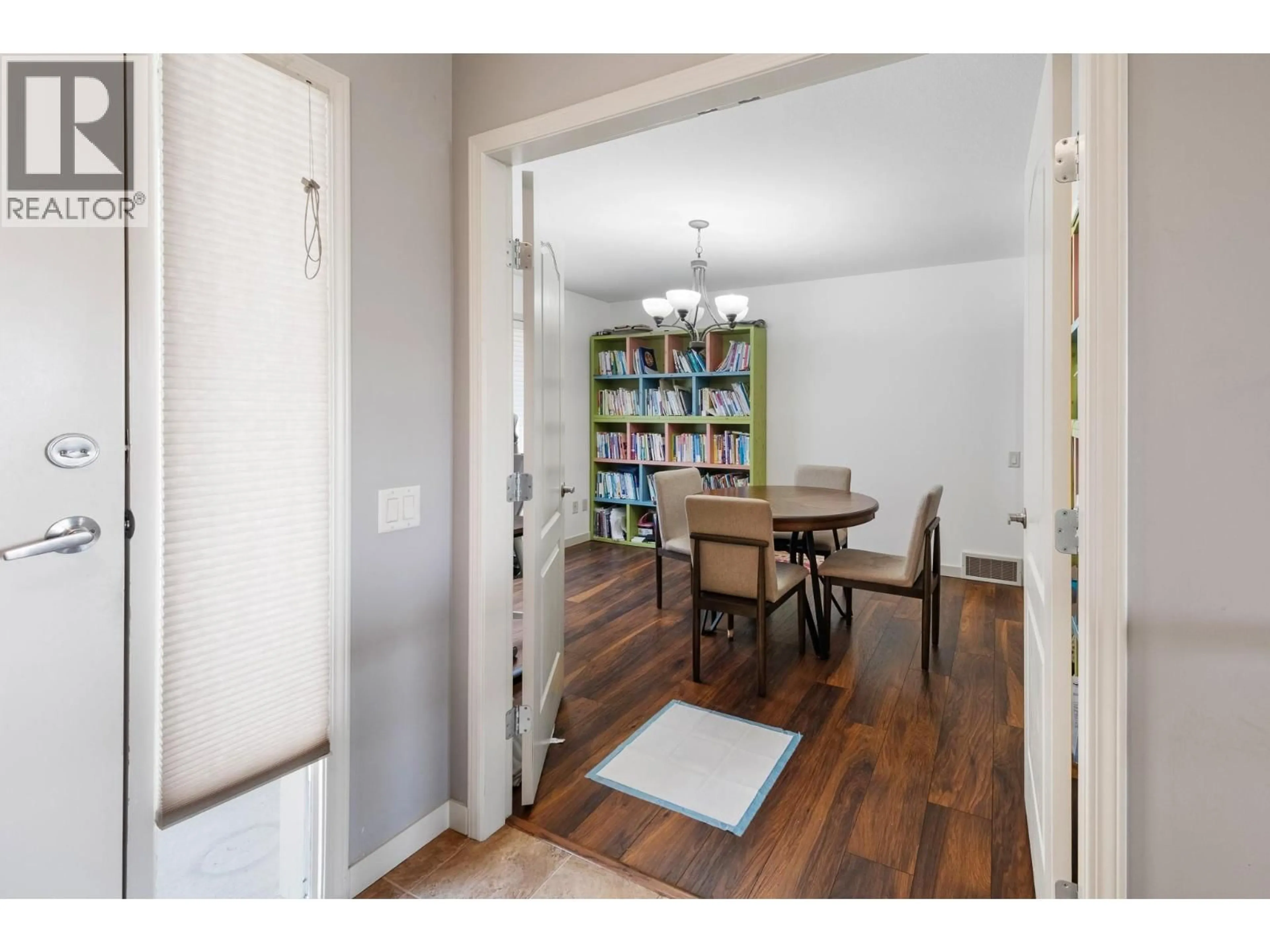 Dining room, wood/laminate floor for 632 ARROWLEAF LANE, Kelowna British Columbia V1W4Y5
