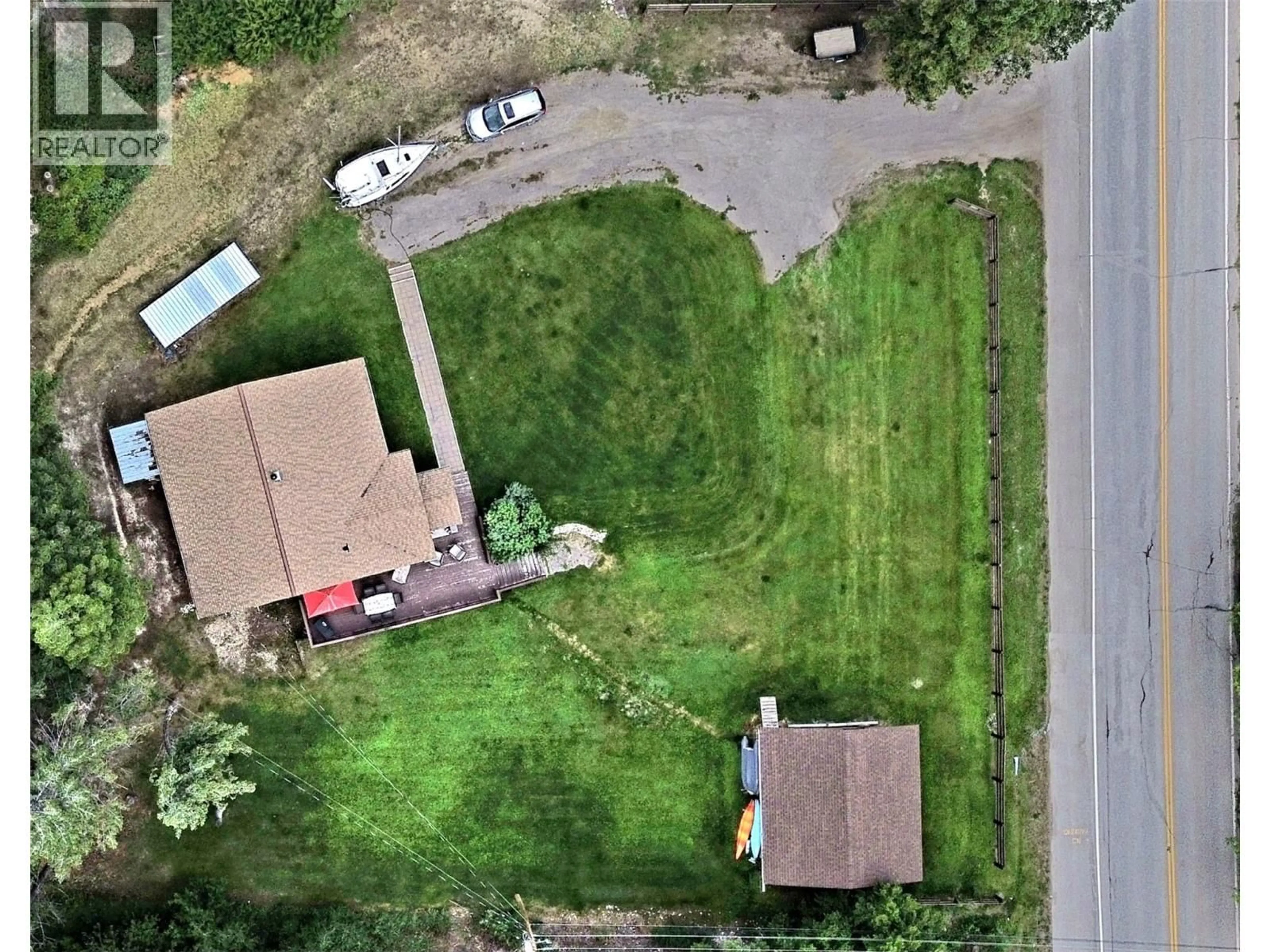 A pic from outside/outdoor area/front of a property/back of a property/a pic from drone, street for 2110 13TH AVENUE, Invermere British Columbia V0A1K4