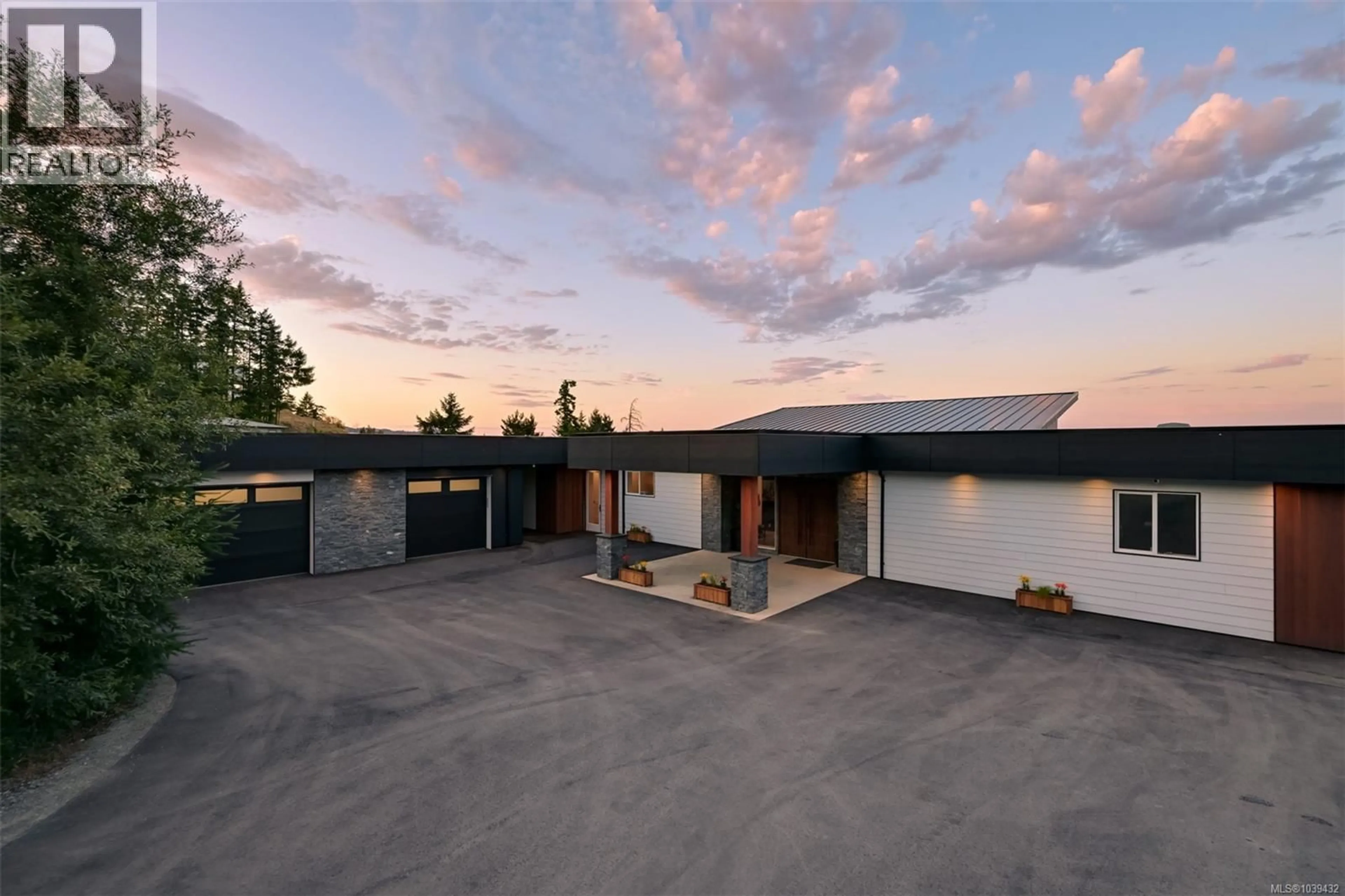 A pic from outside/outdoor area/front of a property/back of a property/a pic from drone, street for 3979 GOLDSTREAM HEIGHTS DRIVE, Shawnigan Lake British Columbia V8H2J1