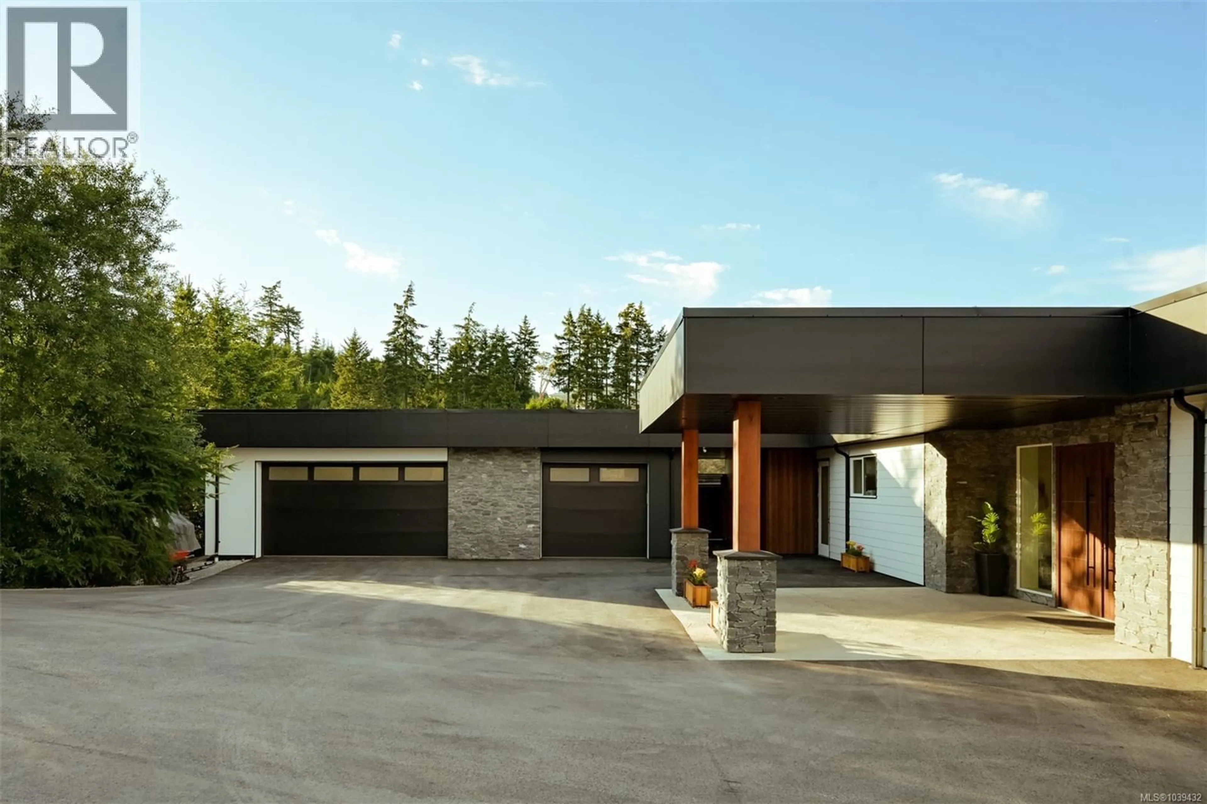 Home with brick exterior material, street for 3979 GOLDSTREAM HEIGHTS DRIVE, Shawnigan Lake British Columbia V8H2J1