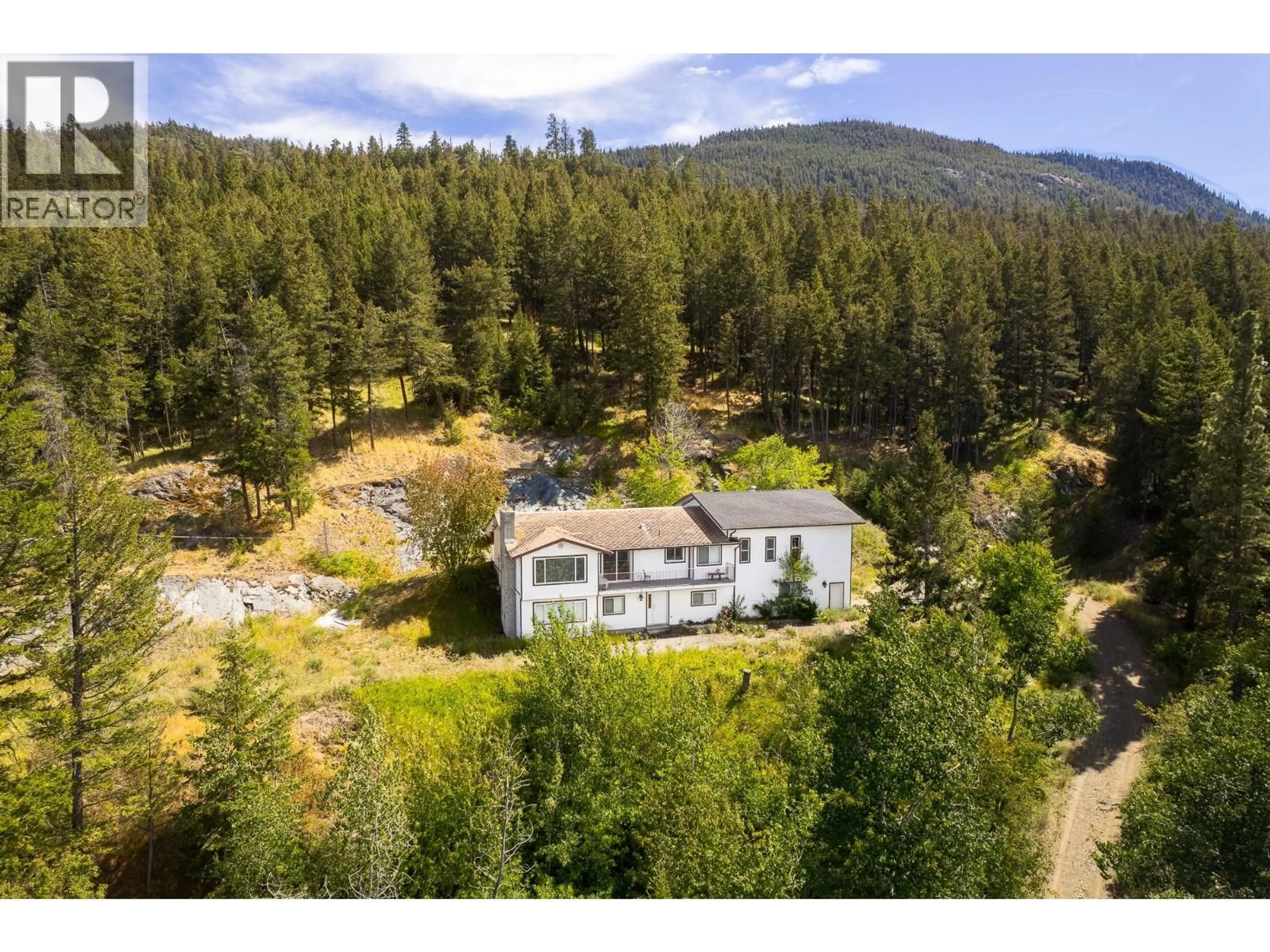 A pic from outside/outdoor area/front of a property/back of a property/a pic from drone, mountain view for 3104 PANORAMA DRIVE, Merritt British Columbia V1K1J4