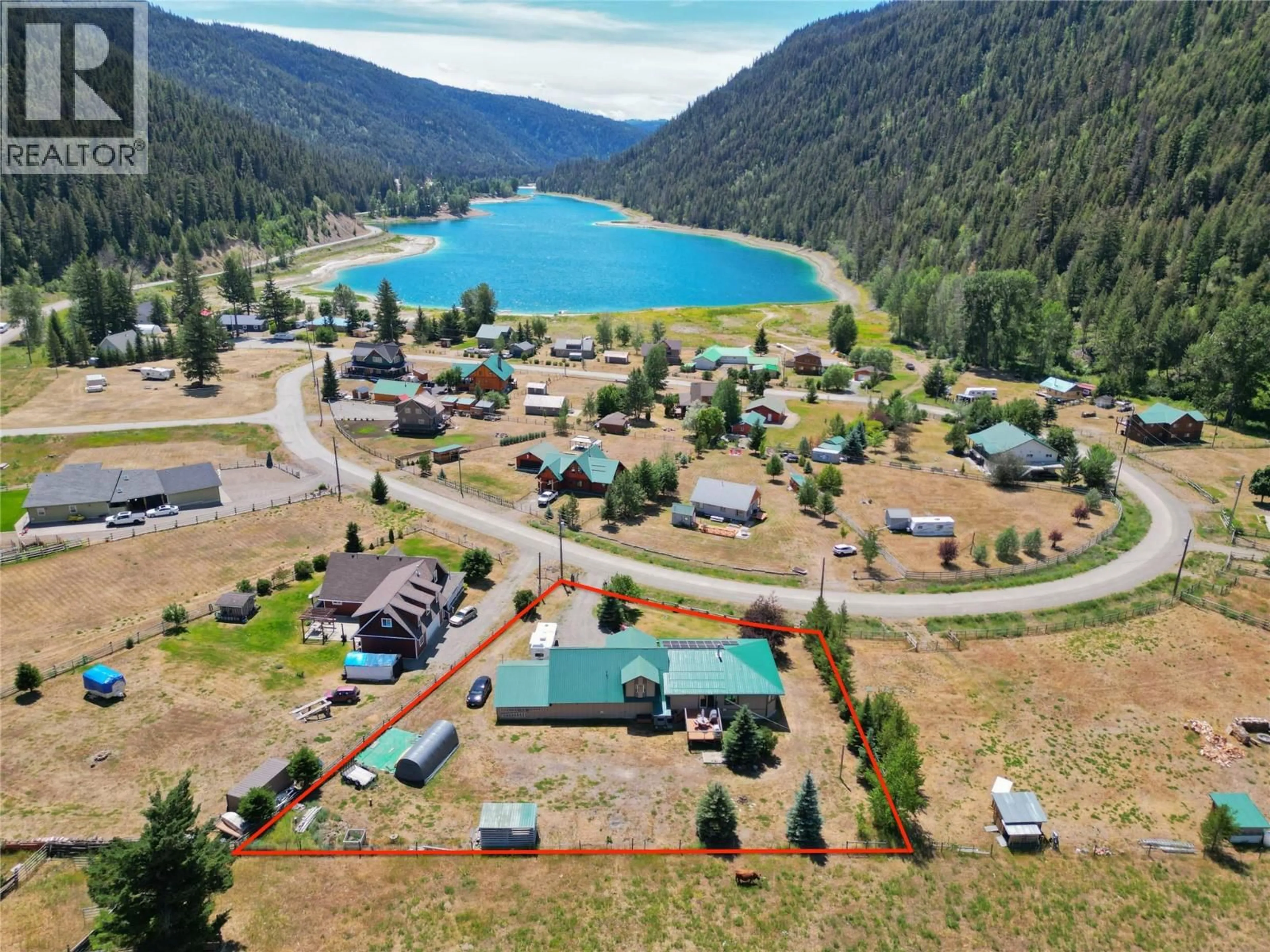 A pic from outside/outdoor area/front of a property/back of a property/a pic from drone, water/lake/river/ocean view for 118 SKYE BLUE LOOP, Princeton British Columbia V0X1W0