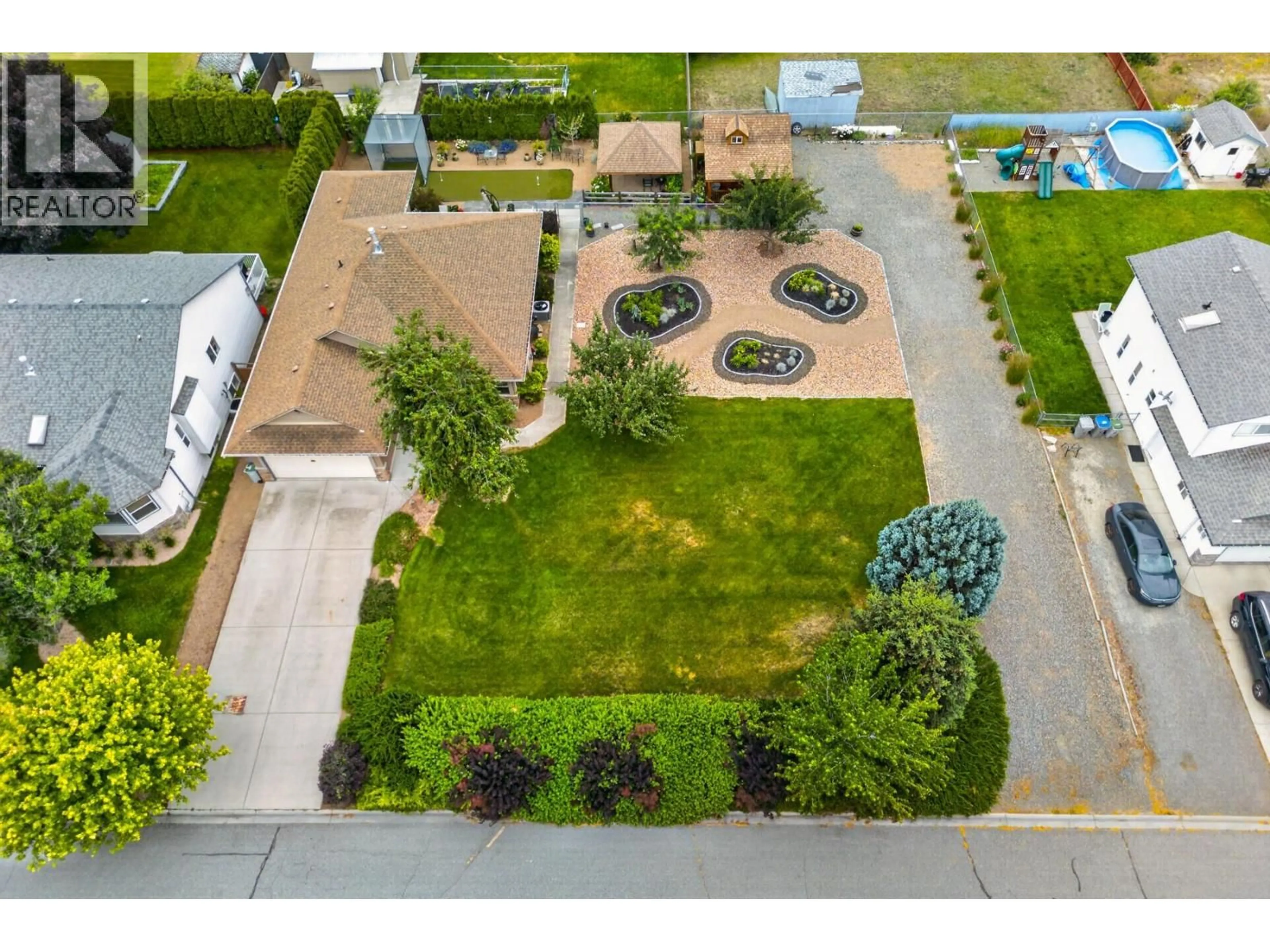 A pic from outside/outdoor area/front of a property/back of a property/a pic from drone, street for 671 MCCURRACH PLACE, Kamloops British Columbia V2B8R1