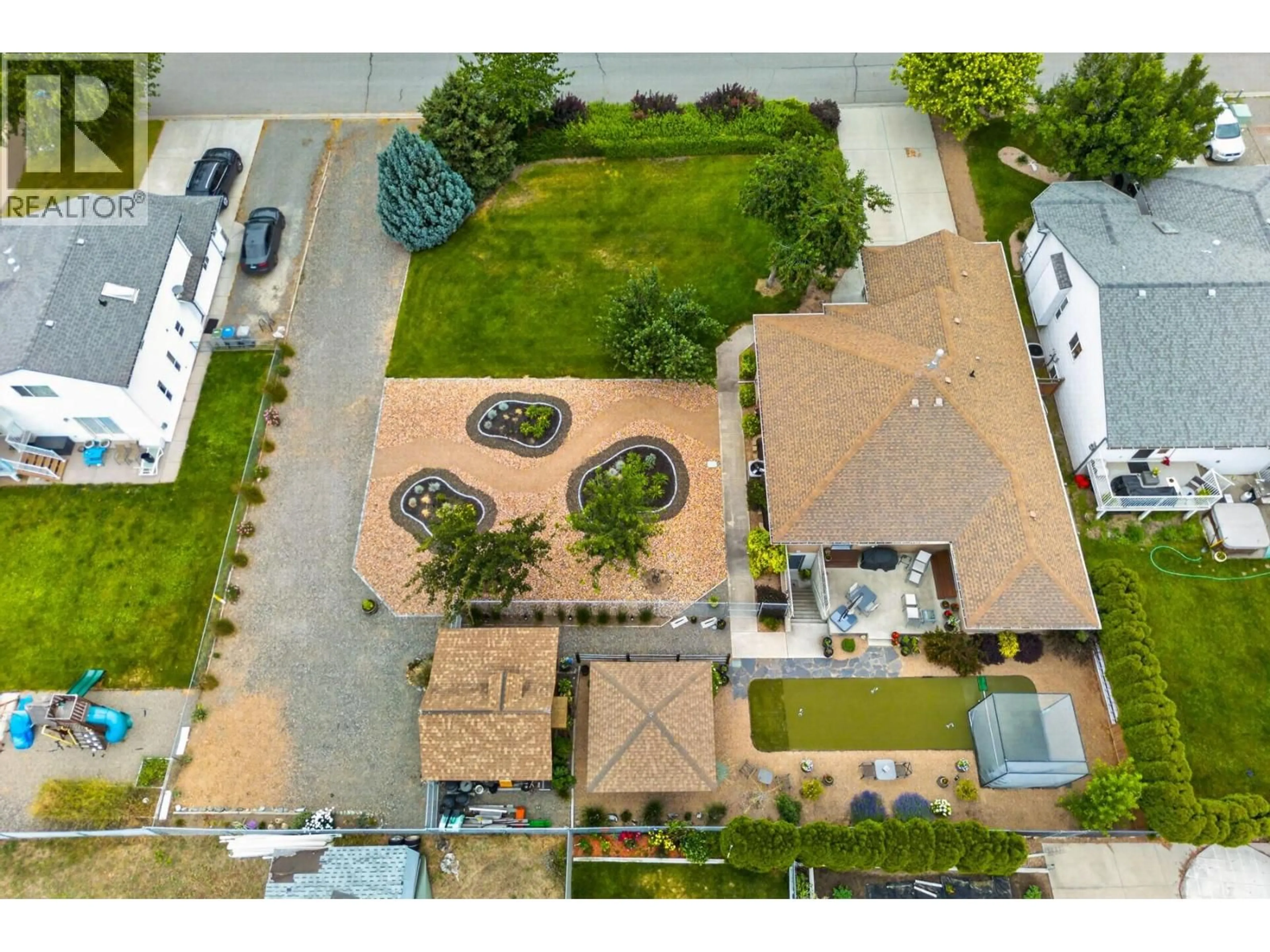 A pic from outside/outdoor area/front of a property/back of a property/a pic from drone, street for 671 MCCURRACH PLACE, Kamloops British Columbia V2B8R1