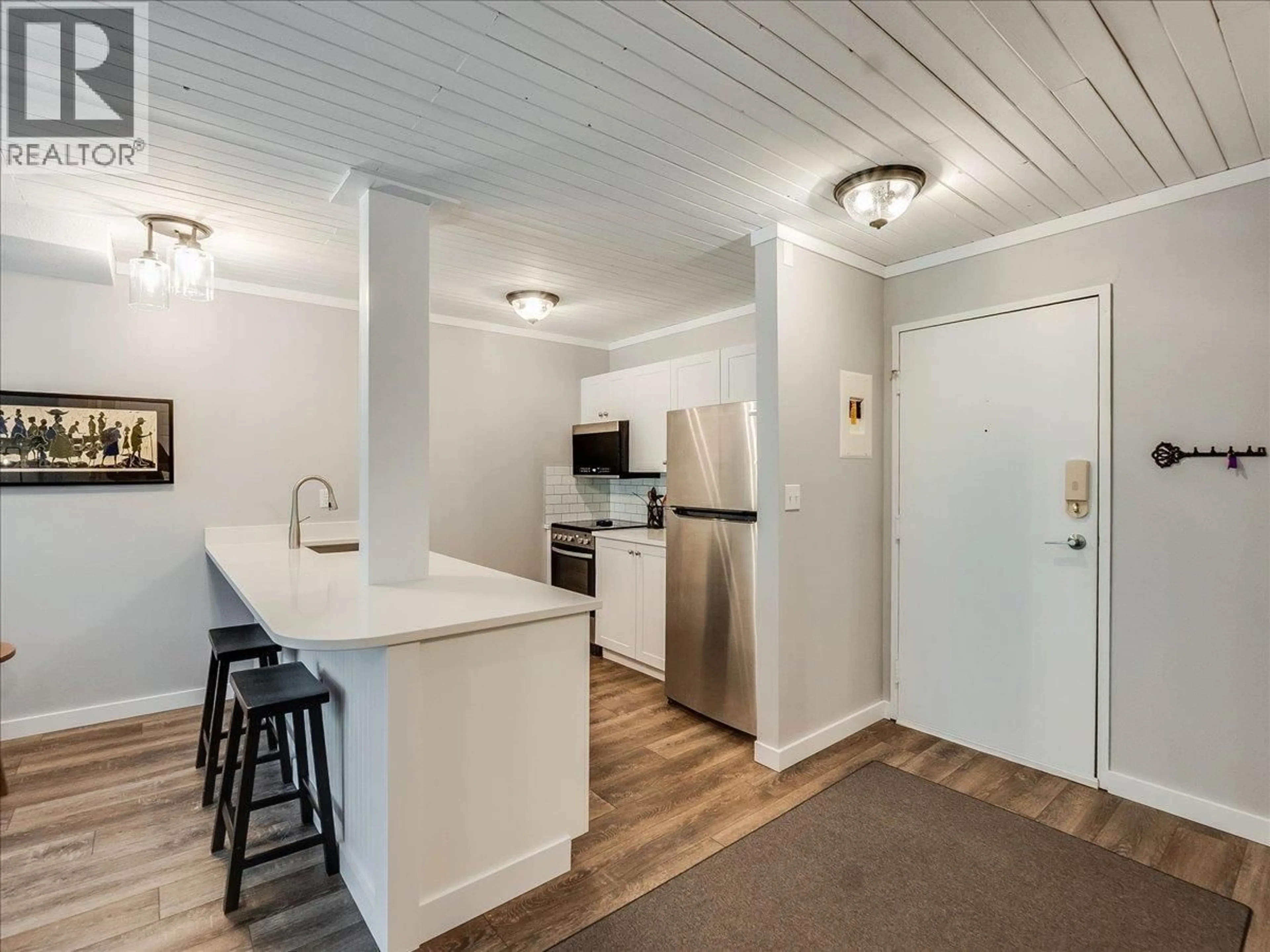 Standard kitchen, wood/laminate floor for 207 - 1800 KIRKUP AVENUE, Rossland British Columbia V0G1Y0