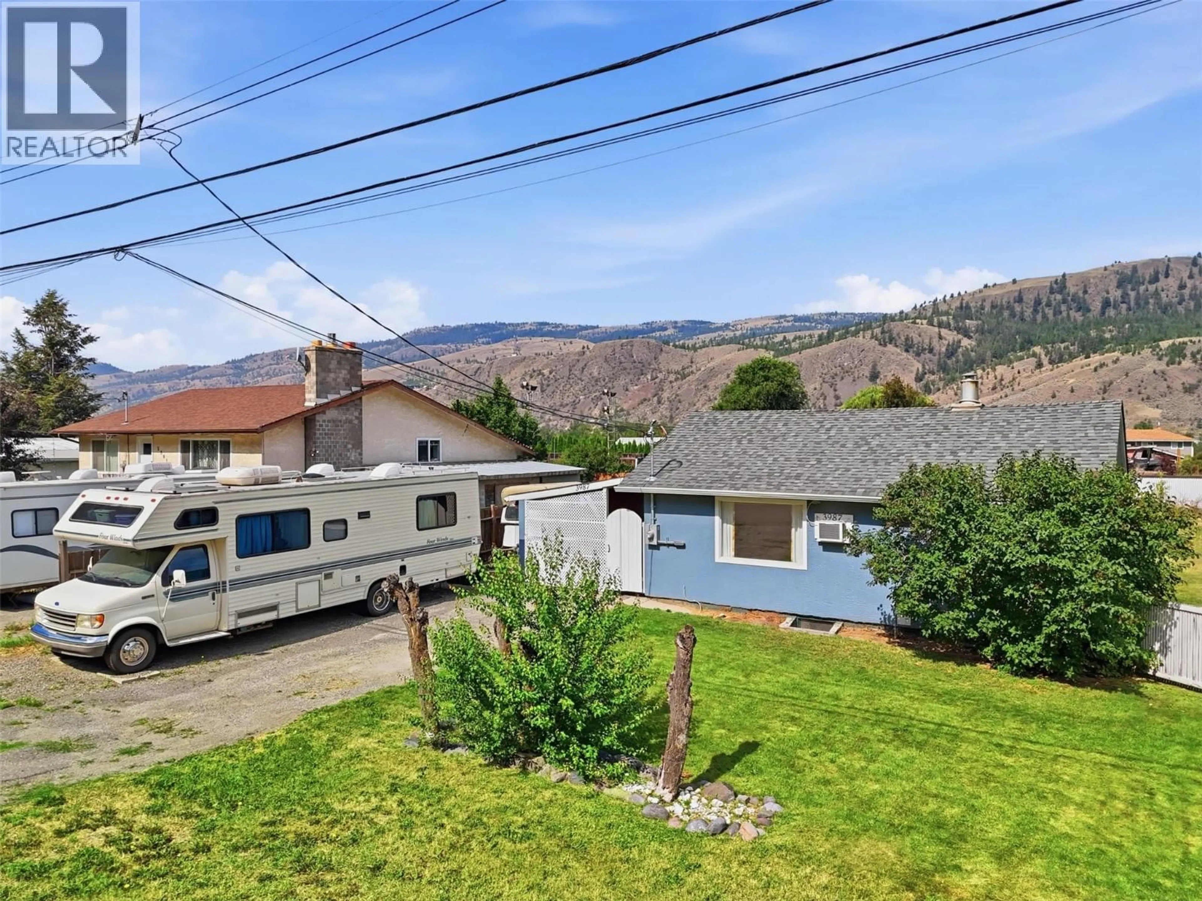 A pic from outside/outdoor area/front of a property/back of a property/a pic from drone, mountain view for 3987 YELLOWHEAD HIGHWAY, Kamloops British Columbia V2H1K6