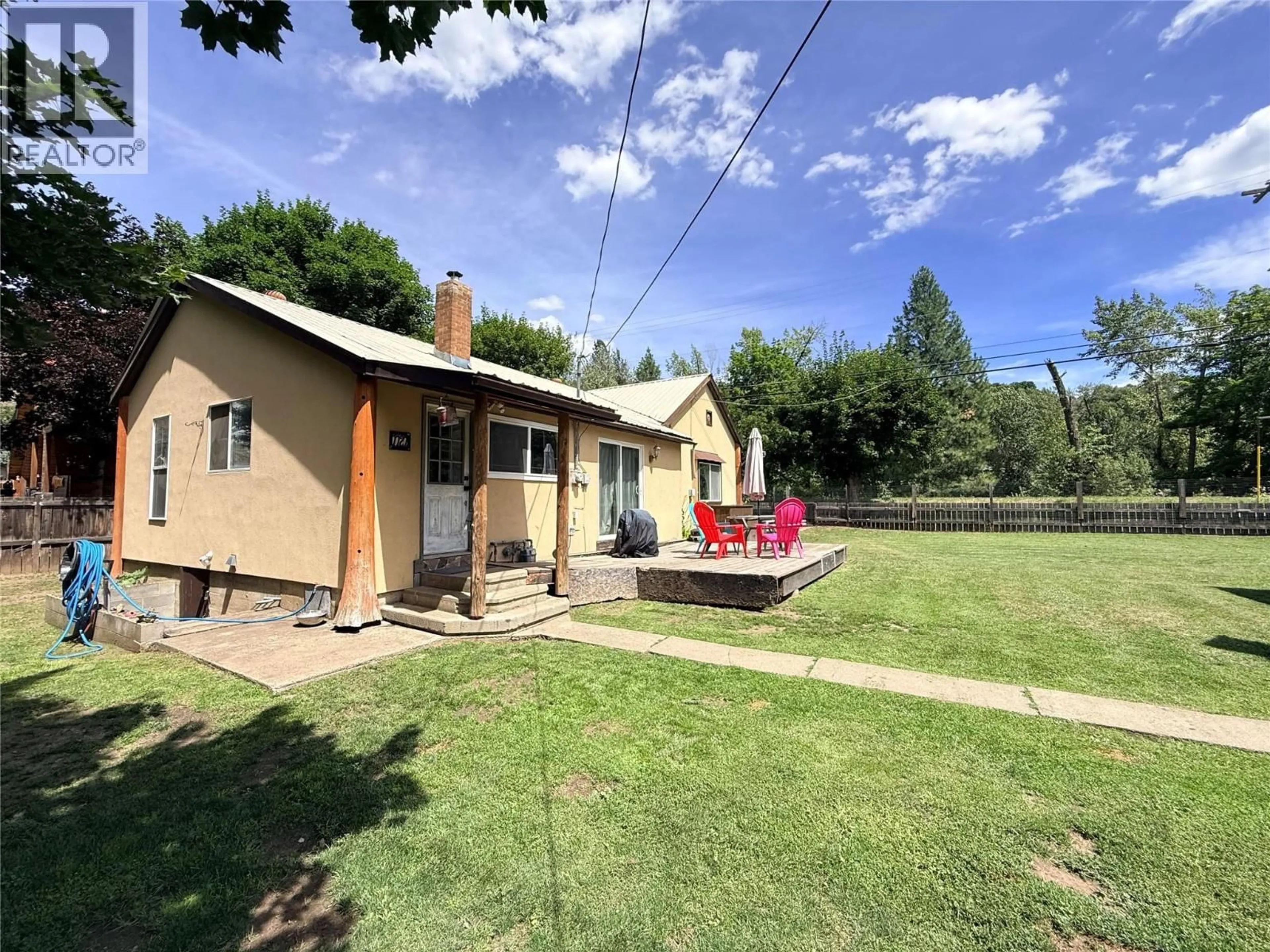 A pic from outside/outdoor area/front of a property/back of a property/a pic from drone, street for 7727 RIVERSIDE DRIVE, Grand Forks British Columbia V0H1H0