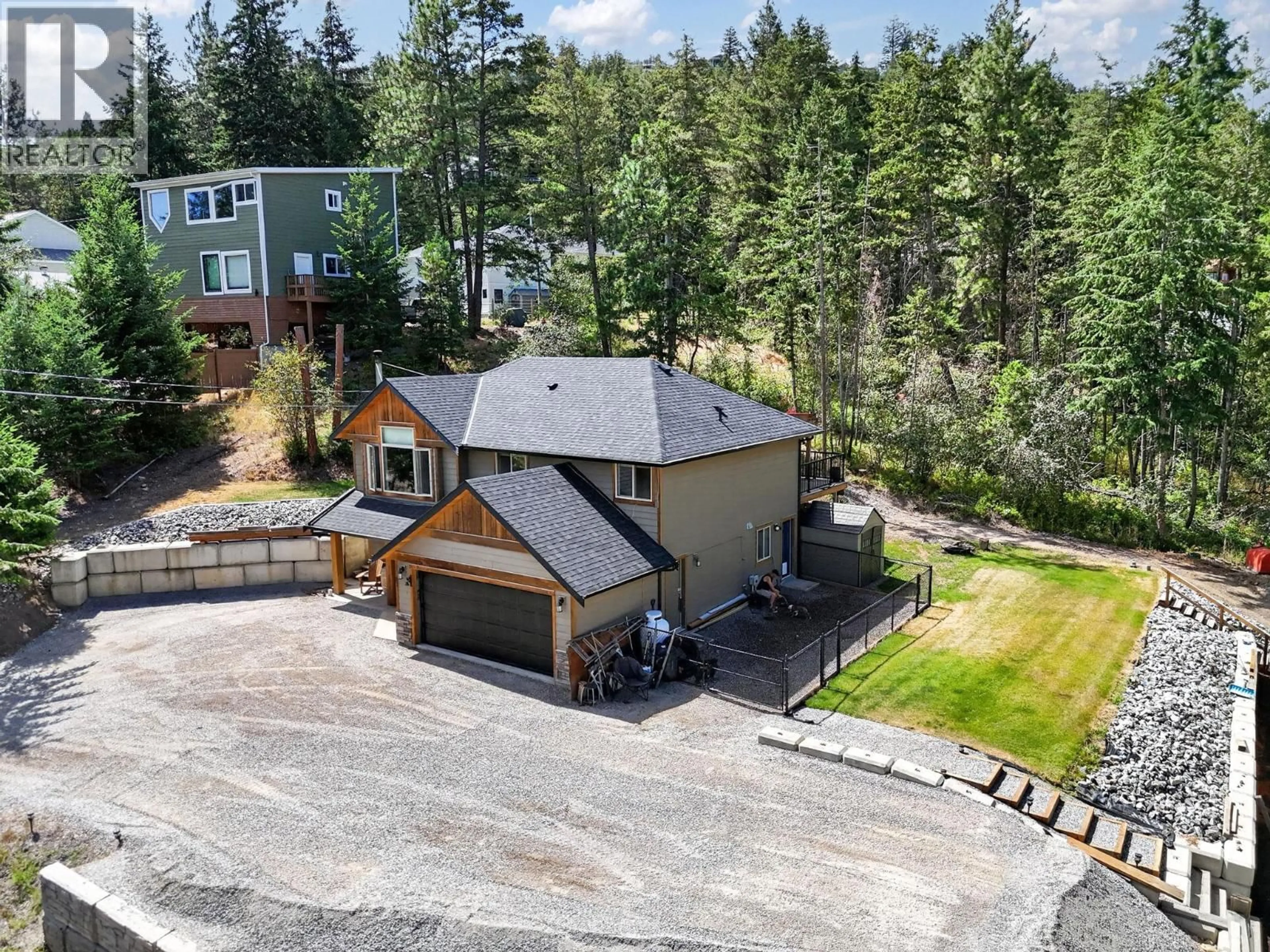 A pic from outside/outdoor area/front of a property/back of a property/a pic from drone, unknown for 87 LARCH ROAD, Vernon British Columbia V1H2C3