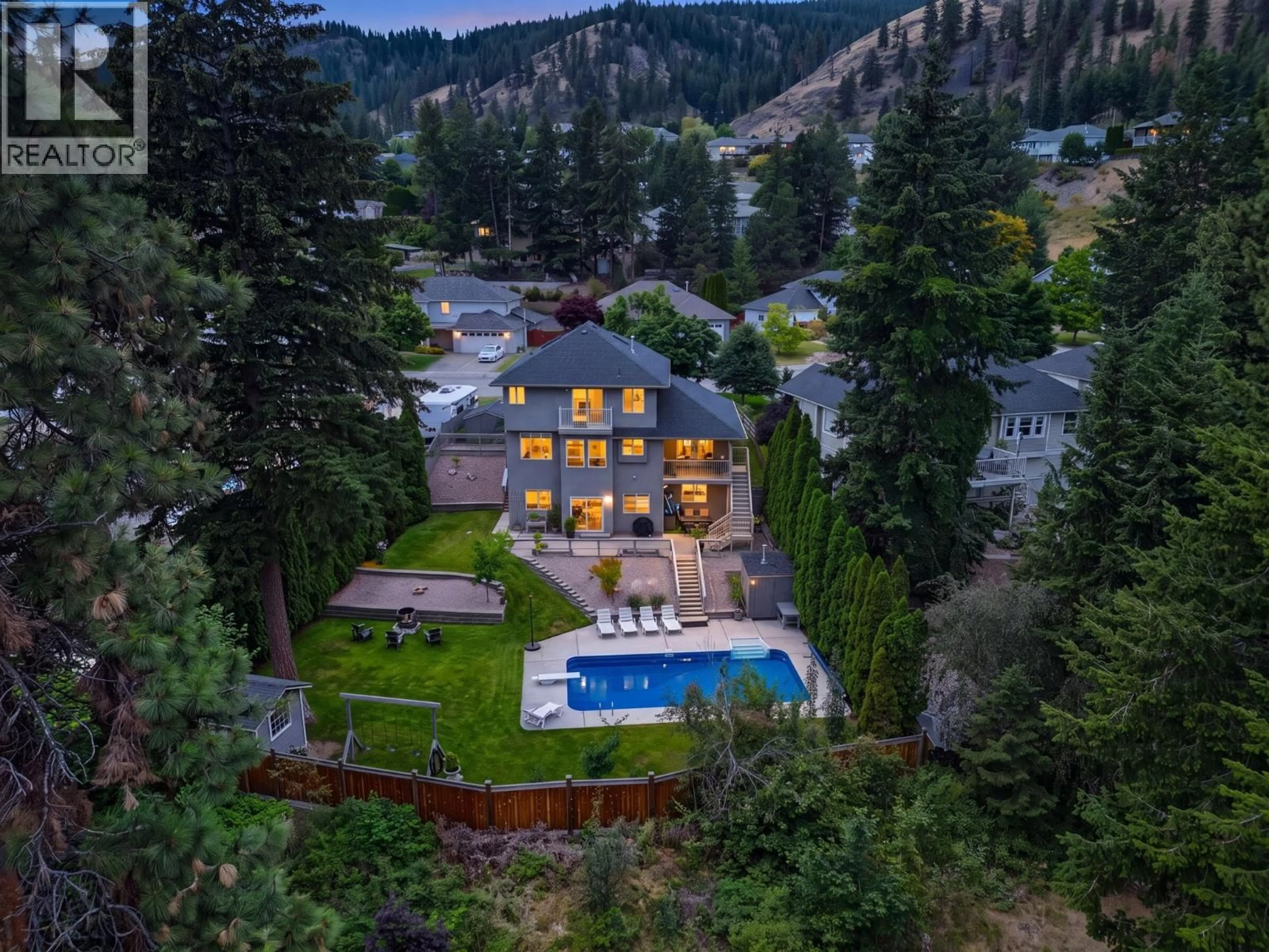 A pic from outside/outdoor area/front of a property/back of a property/a pic from drone, mountain view for 2156 SHANNON WOODS WAY, West Kelowna British Columbia V4T2R5