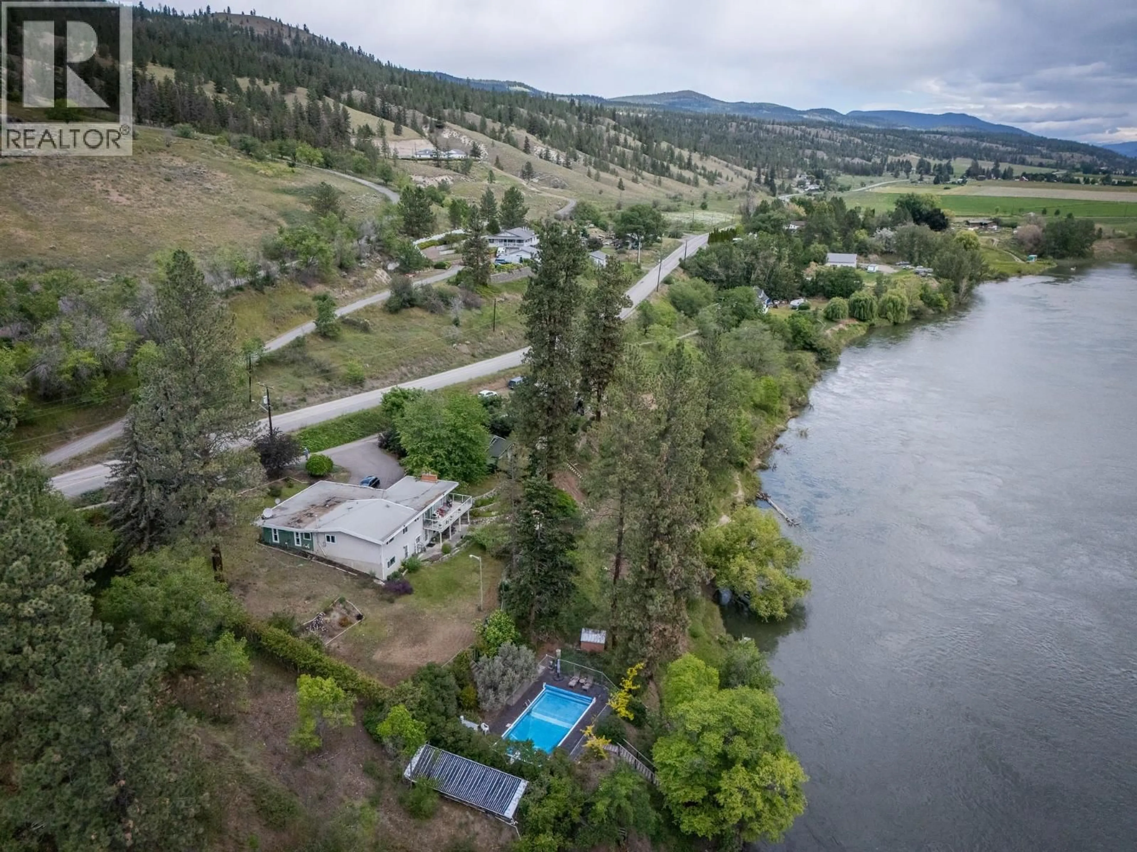 A pic from outside/outdoor area/front of a property/back of a property/a pic from drone, water/lake/river/ocean view for 4707 WESTSYDE ROAD, Kamloops British Columbia V2B8N4