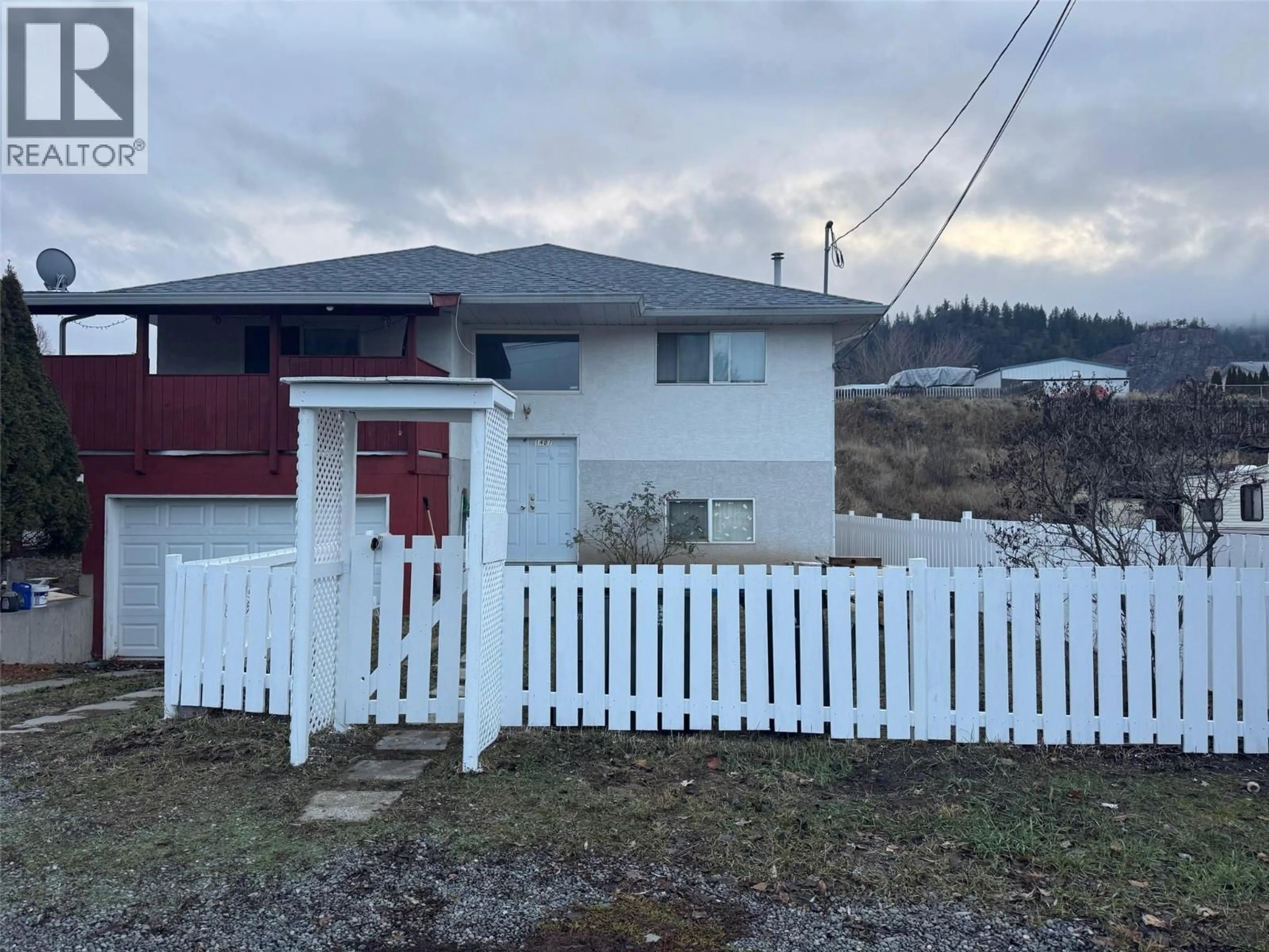 A pic from outside/outdoor area/front of a property/back of a property/a pic from drone, unknown for 1407 FIR AVENUE, Merritt British Columbia V1K1L1