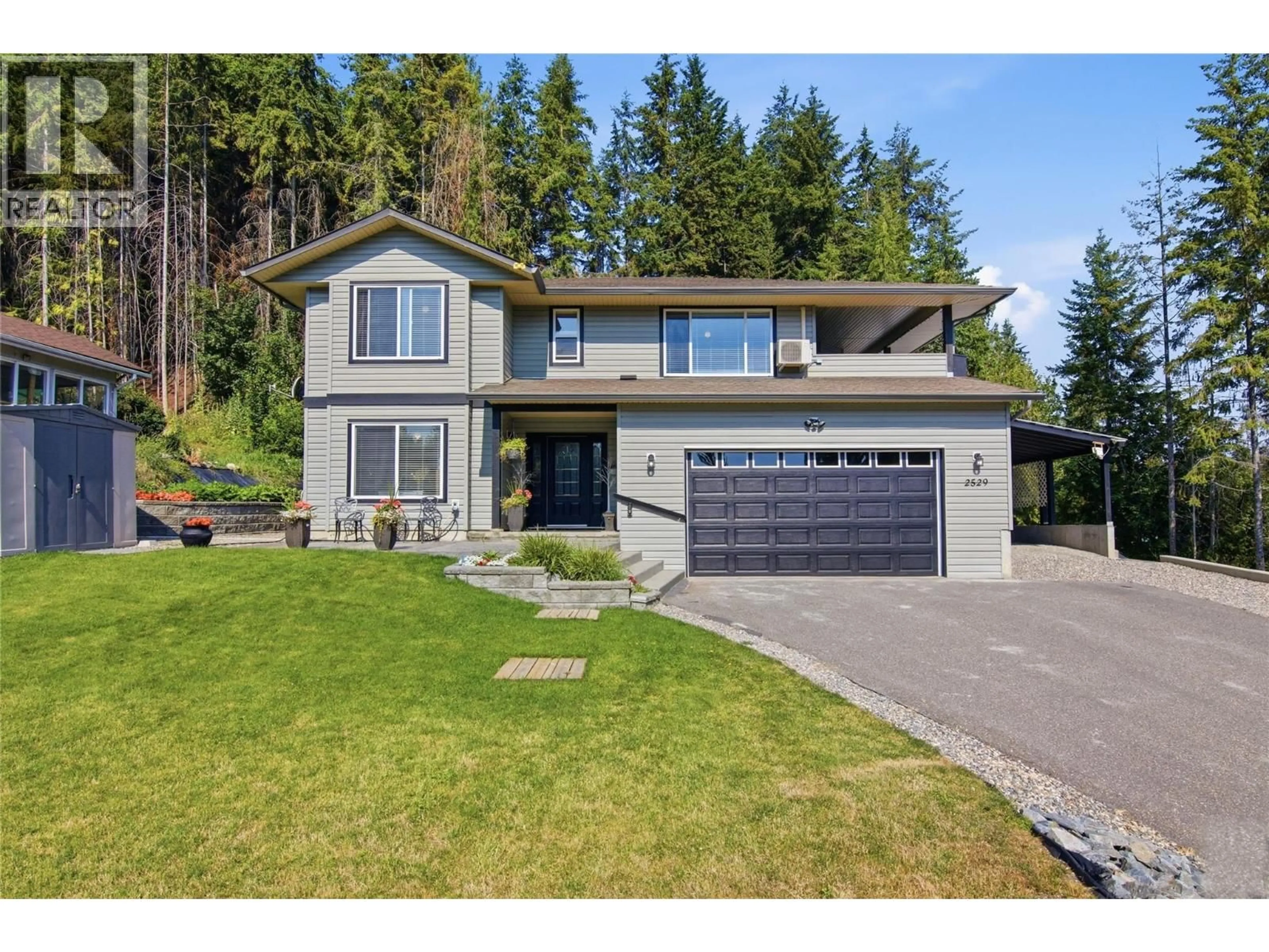 Home with vinyl exterior material, street for 2529 PARKDALE PLACE, Blind Bay British Columbia V0E1H2