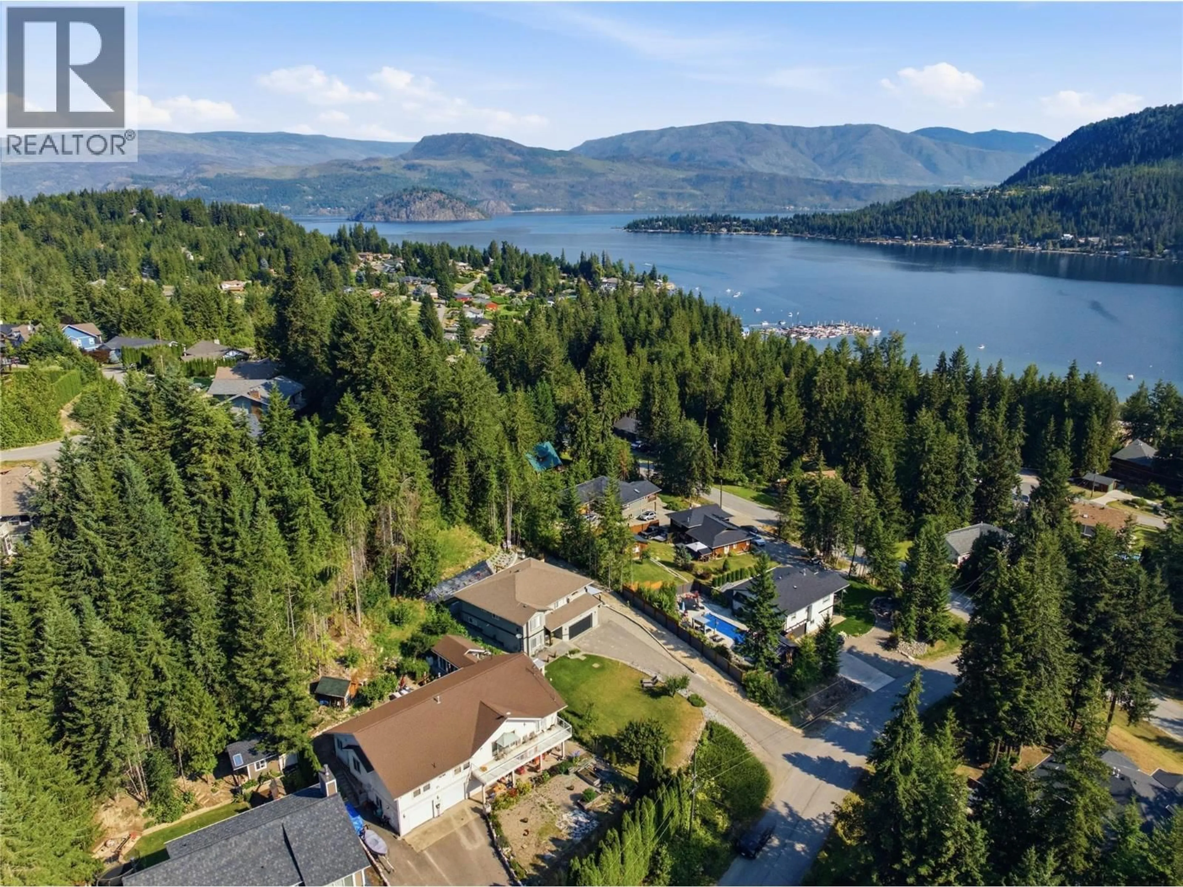 A pic from outside/outdoor area/front of a property/back of a property/a pic from drone, water/lake/river/ocean view for 2529 PARKDALE PLACE, Blind Bay British Columbia V0E1H2