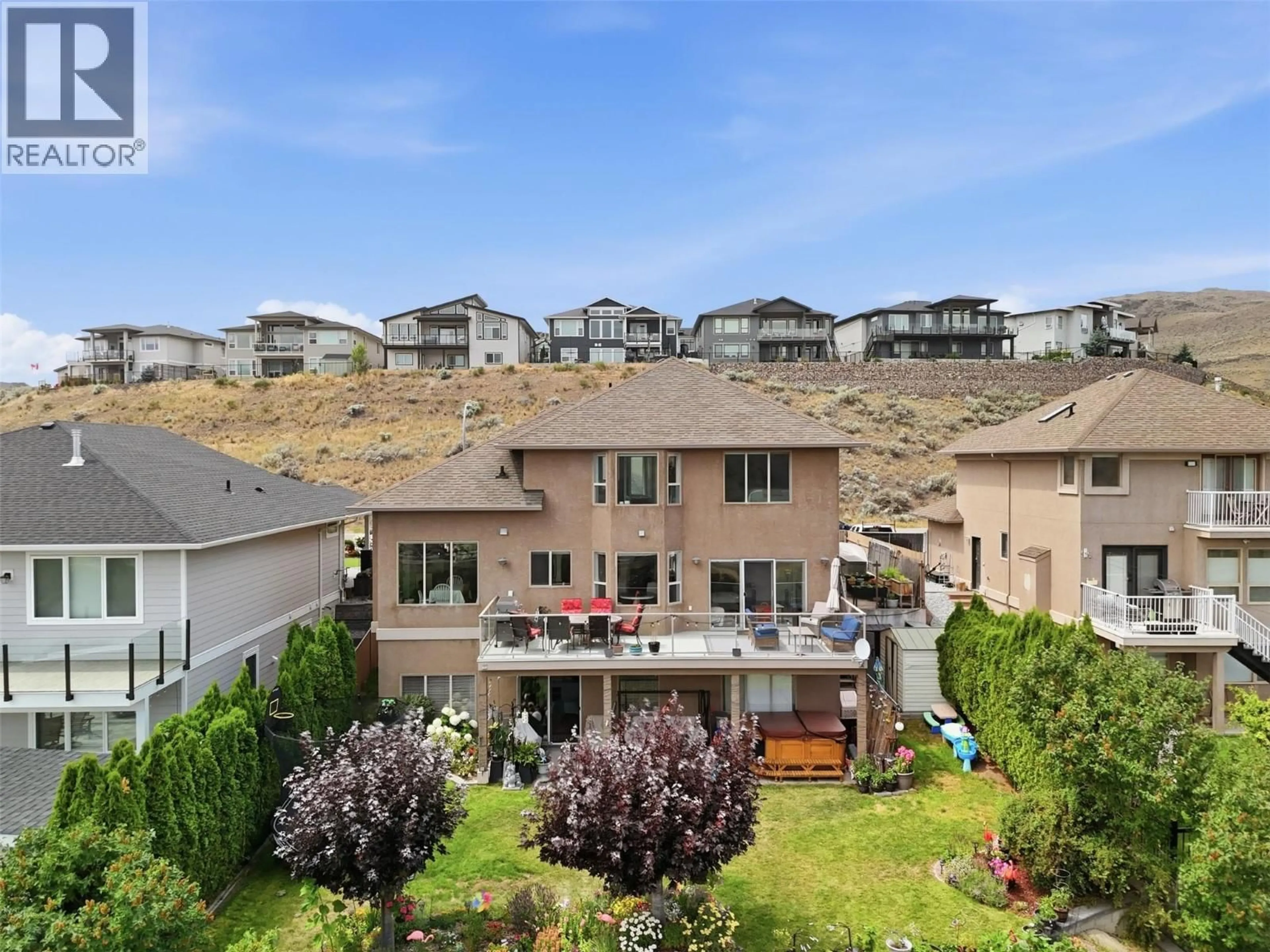 A pic from outside/outdoor area/front of a property/back of a property/a pic from drone, mountain view for 907 QUAIL DRIVE, Kamloops British Columbia V2B8N9