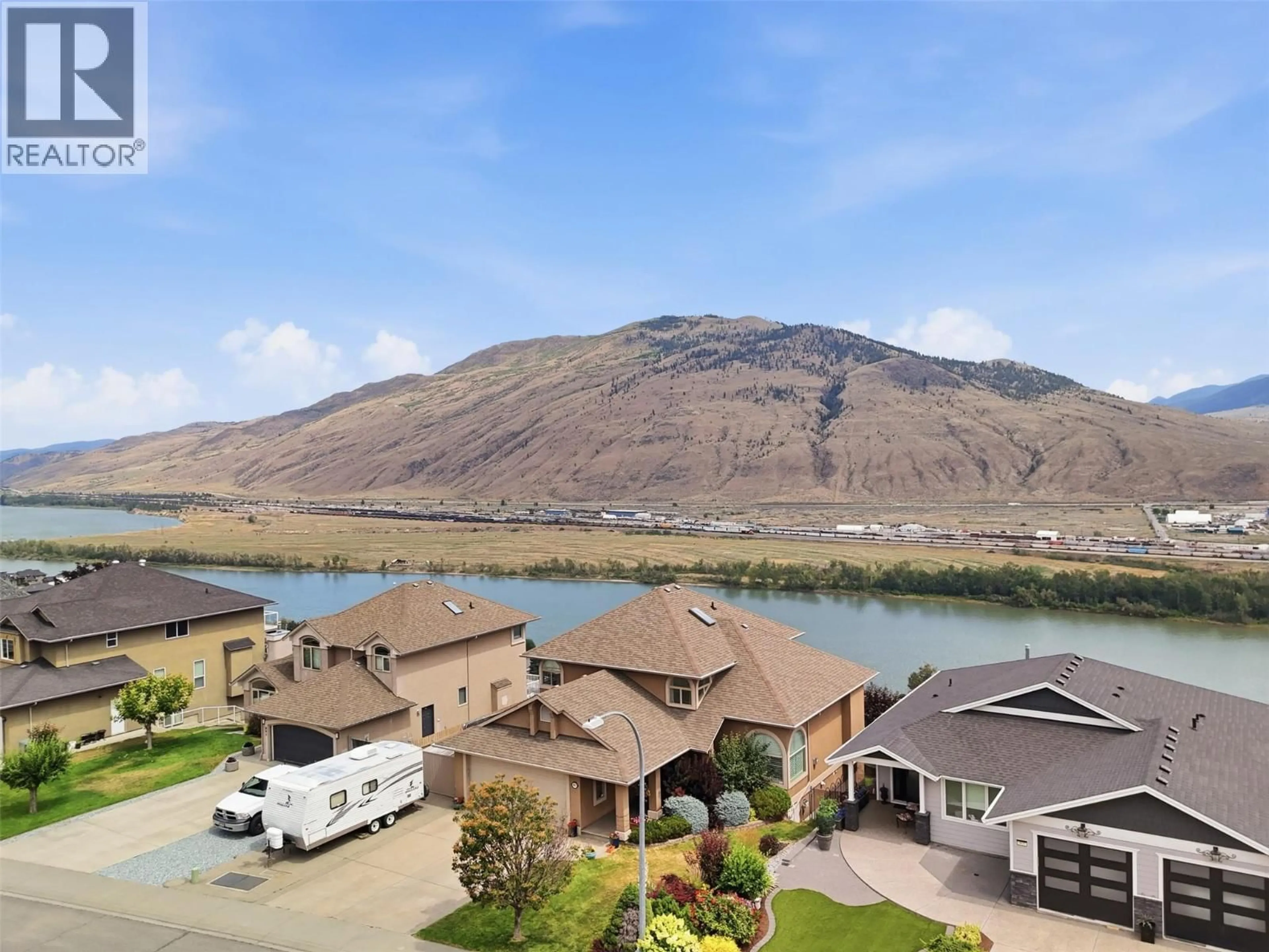 A pic from outside/outdoor area/front of a property/back of a property/a pic from drone, water/lake/river/ocean view for 907 QUAIL DRIVE, Kamloops British Columbia V2B8N9