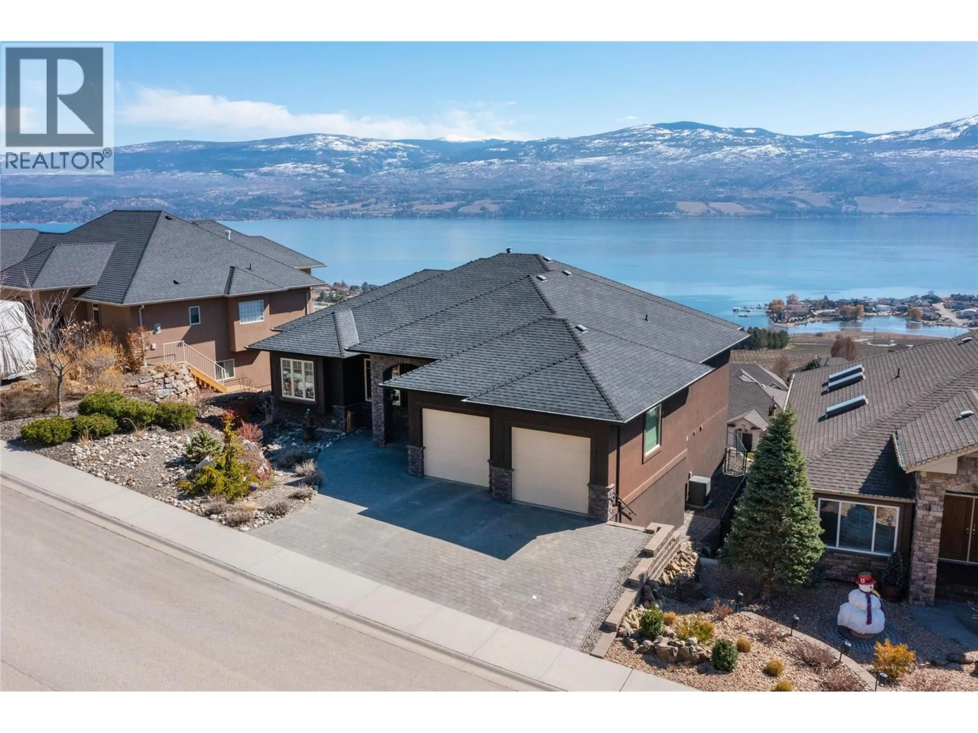 A pic from outside/outdoor area/front of a property/back of a property/a pic from drone, water/lake/river/ocean view for 1487 PINOT GRIS DRIVE, West Kelowna British Columbia V4T2Y6