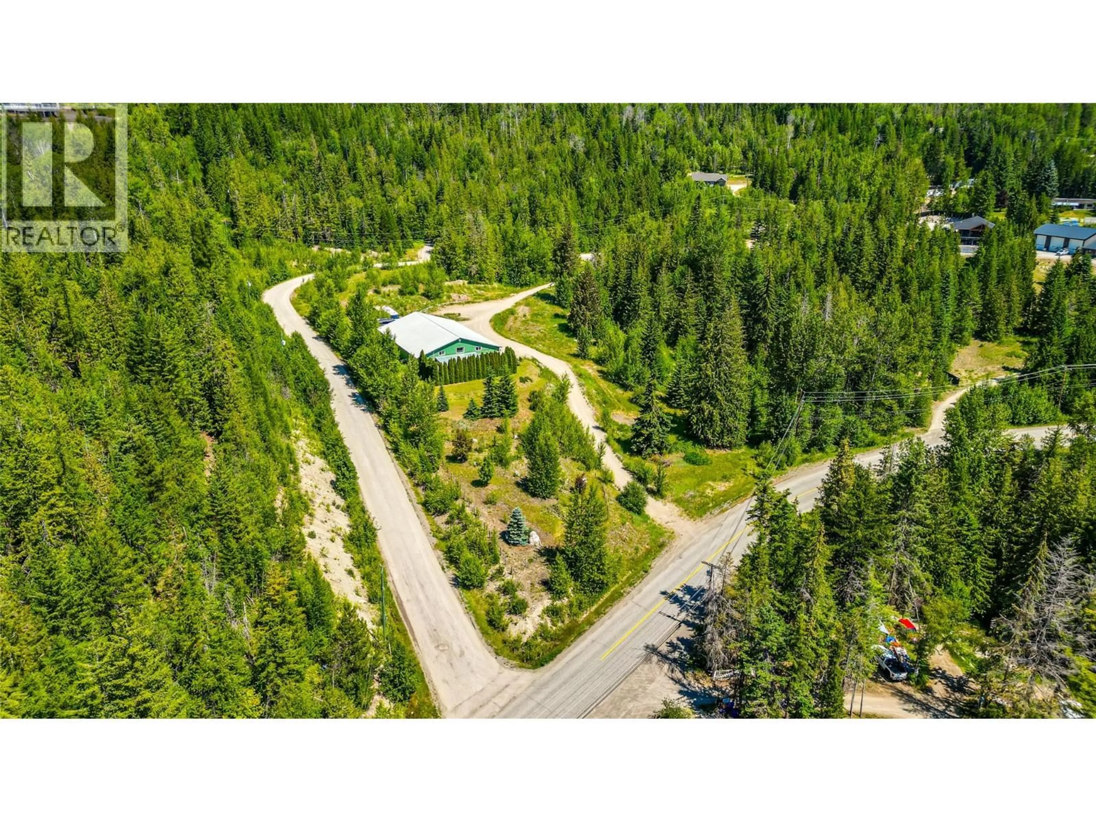 A pic from outside/outdoor area/front of a property/back of a property/a pic from drone, forest/trees view for 8475 SILVER STAR ROAD, Vernon British Columbia V1B3M7