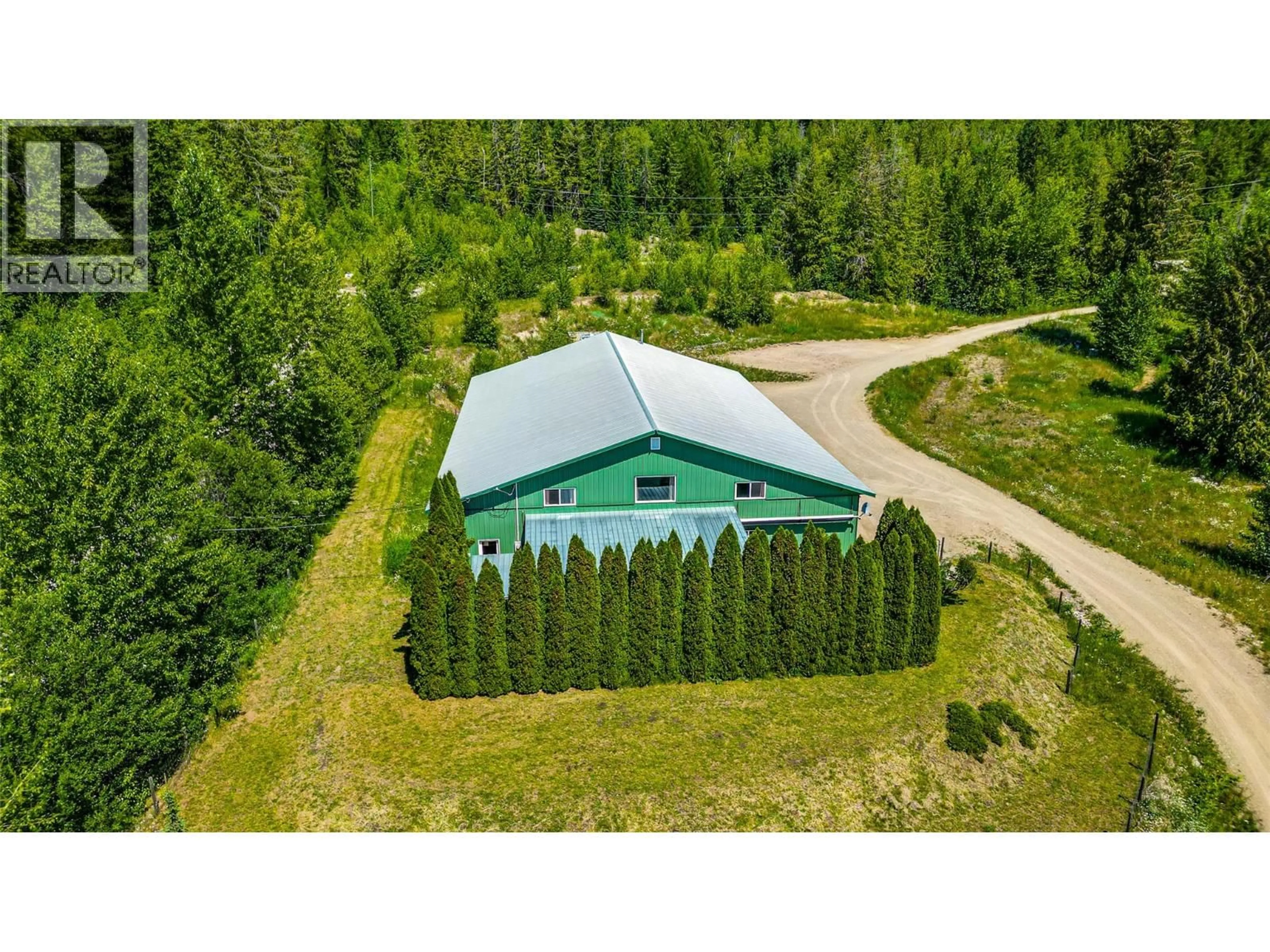 A pic from outside/outdoor area/front of a property/back of a property/a pic from drone, forest/trees view for 8475 SILVER STAR ROAD, Vernon British Columbia V1B3M7