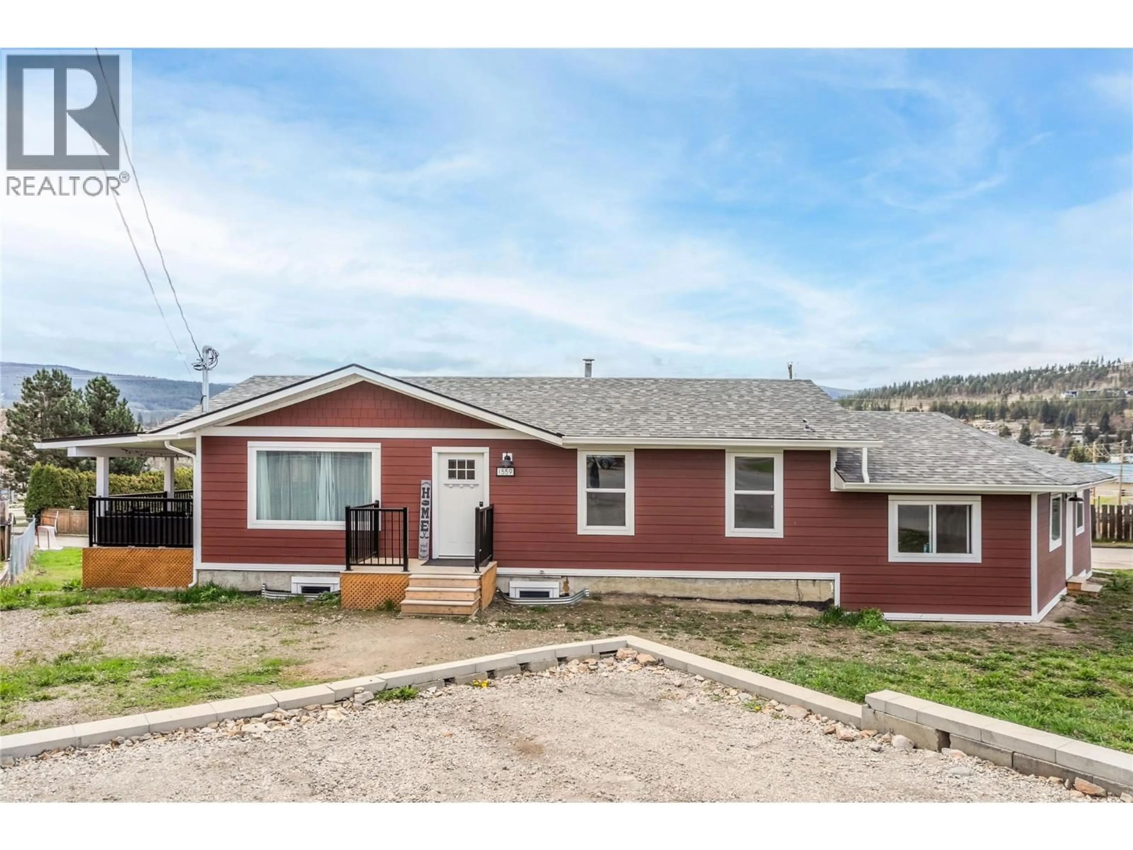 Home with vinyl exterior material, street for 1559 DUNCAN COURT, Kelowna British Columbia V1P1L2
