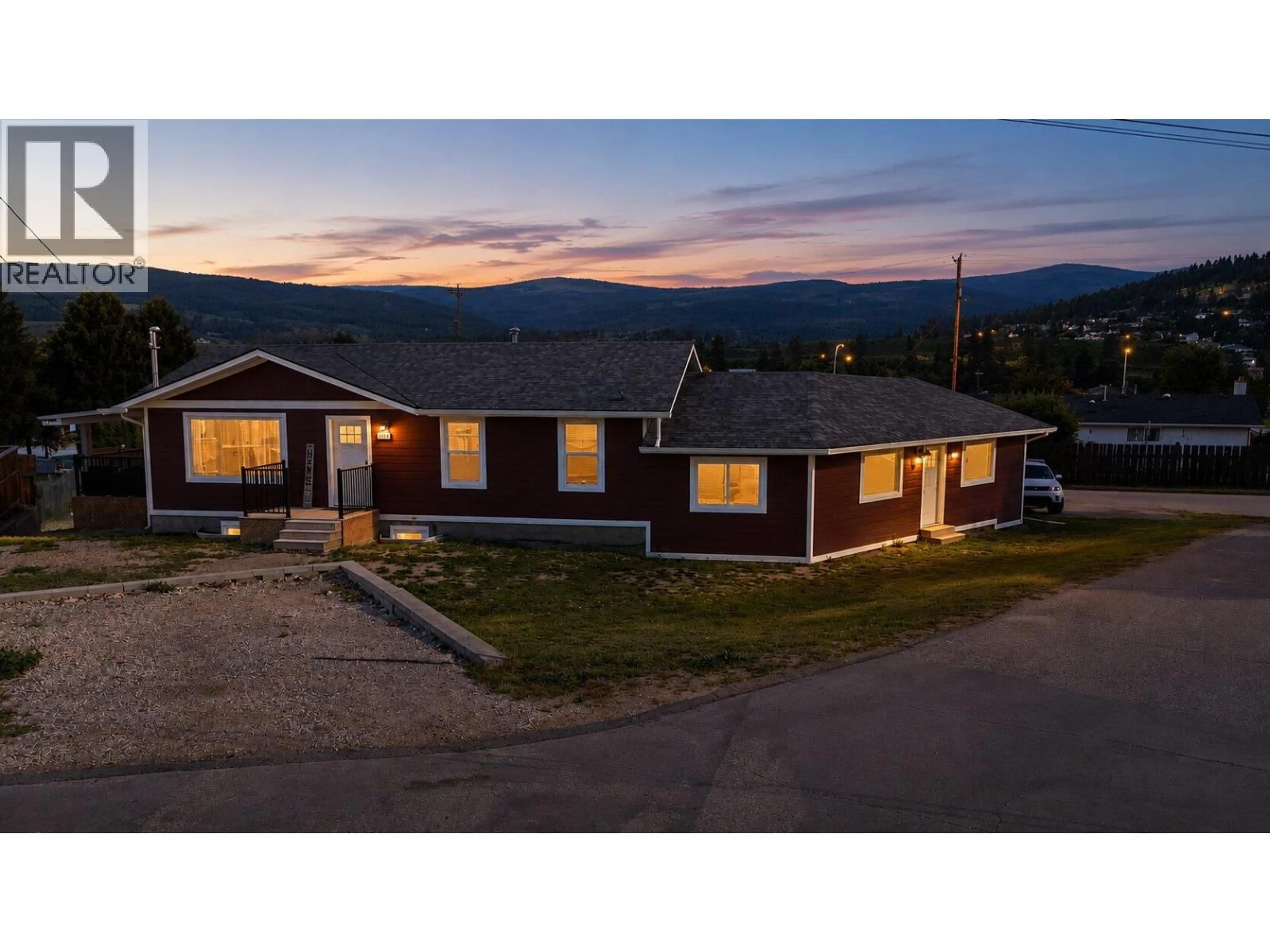 A pic from outside/outdoor area/front of a property/back of a property/a pic from drone, mountain view for 1559 DUNCAN COURT, Kelowna British Columbia V1P1L2