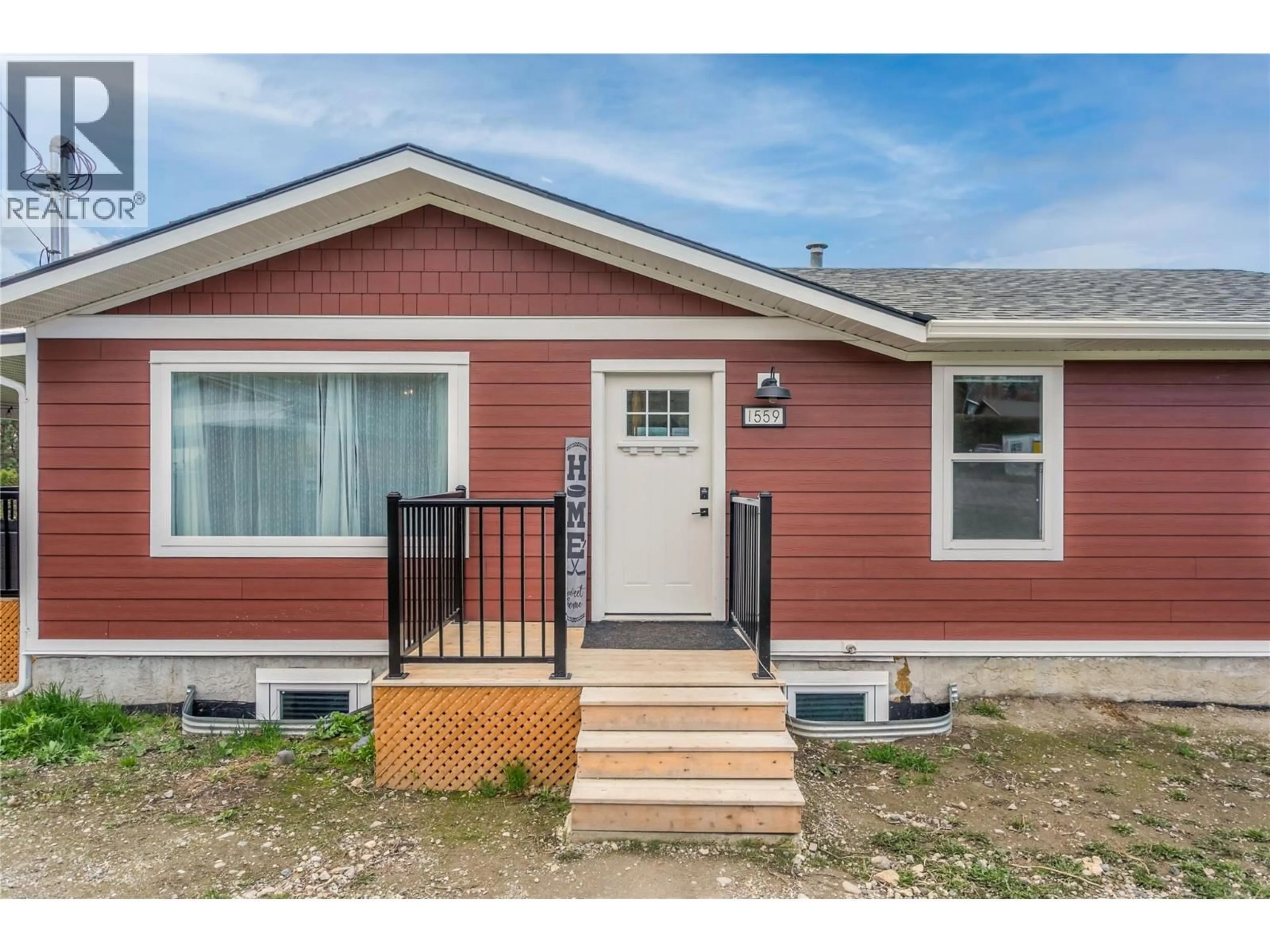Home with vinyl exterior material, street for 1559 DUNCAN COURT, Kelowna British Columbia V1P1L2