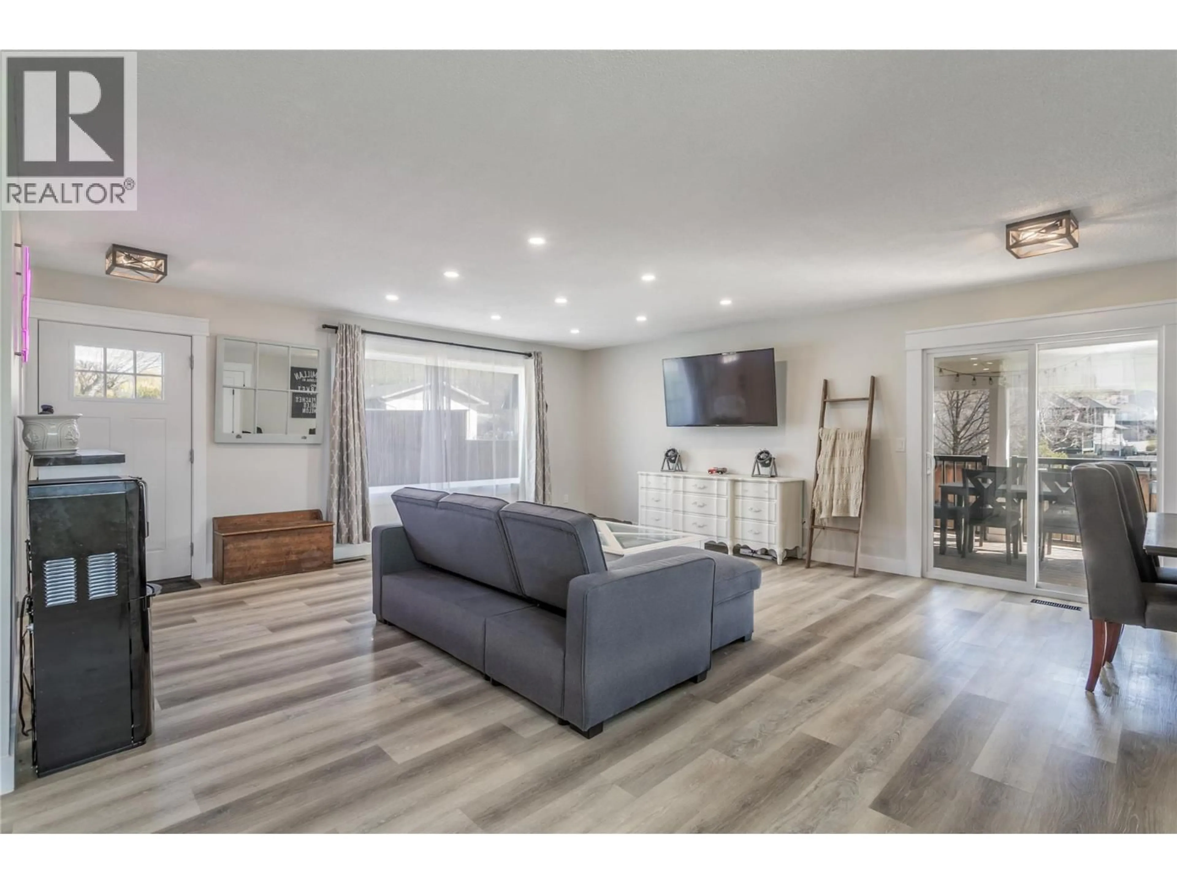 Living room with furniture, unknown for 1559 DUNCAN COURT, Kelowna British Columbia V1P1L2