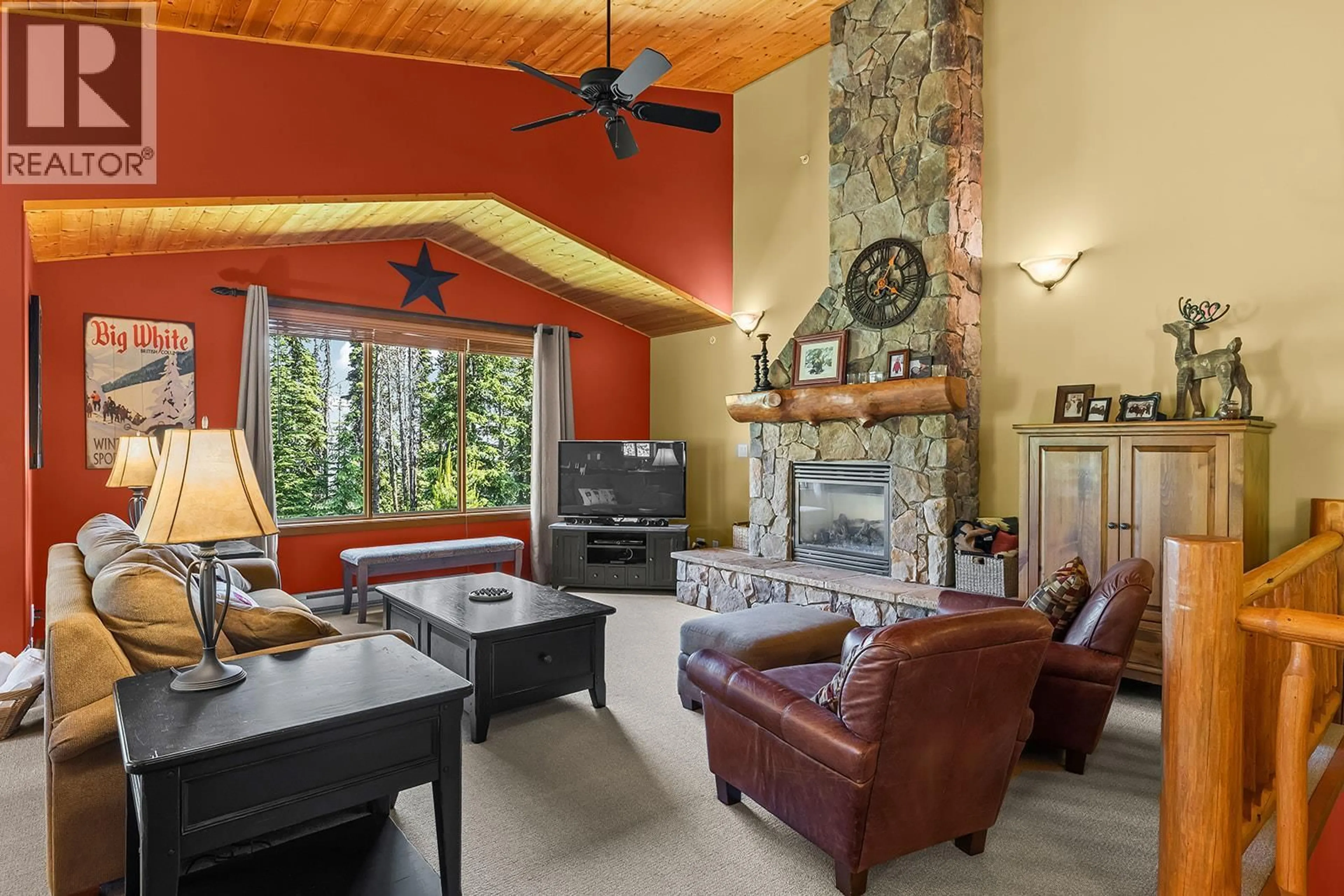 Living room with furniture, ceramic/tile floor for 11 - 5940 SNOW PINES WAY, Big White British Columbia V1P1P3