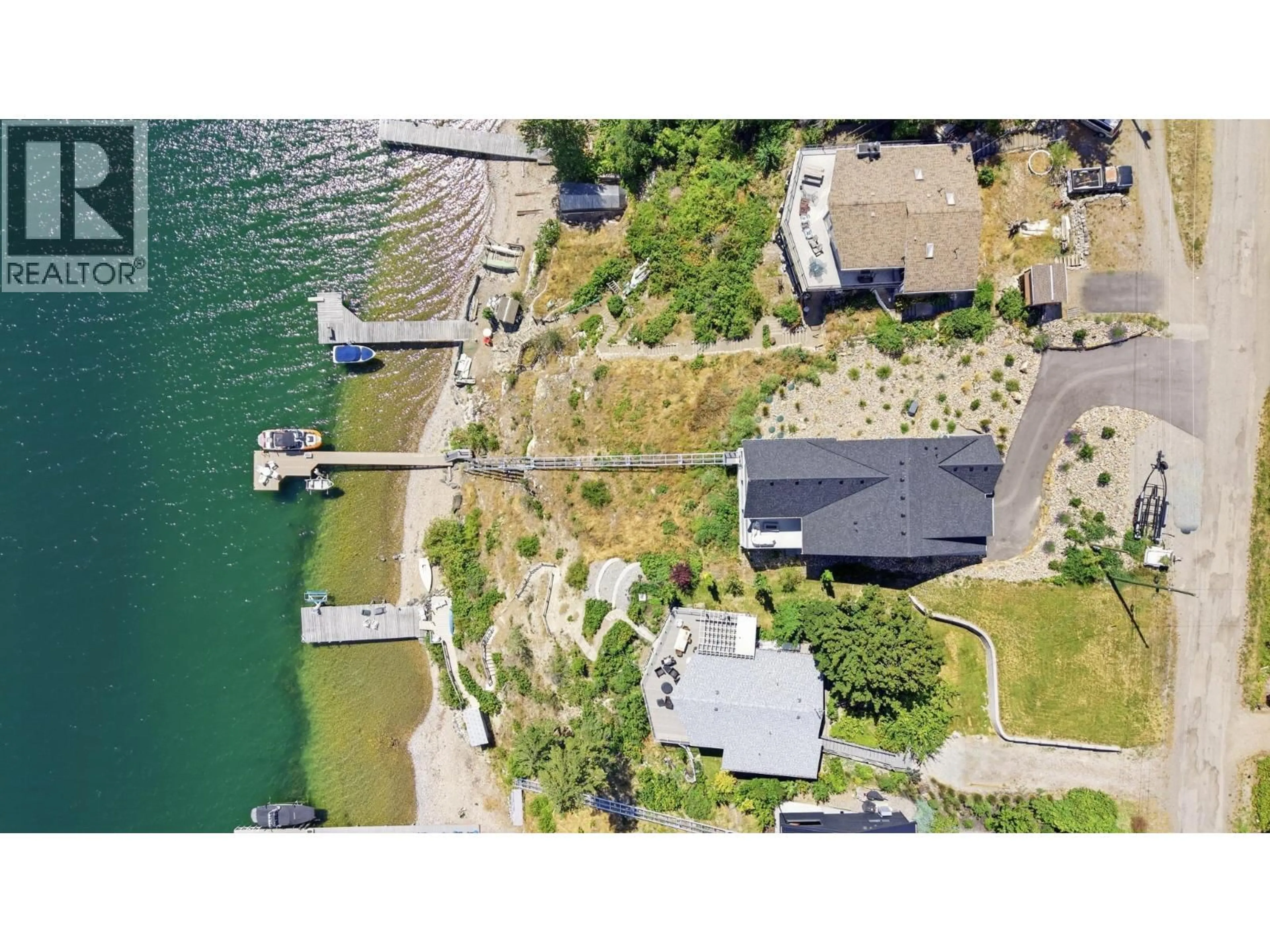 A pic from outside/outdoor area/front of a property/back of a property/a pic from drone, water/lake/river/ocean view for 45 NERIE ROAD, Vernon British Columbia V1H2E4