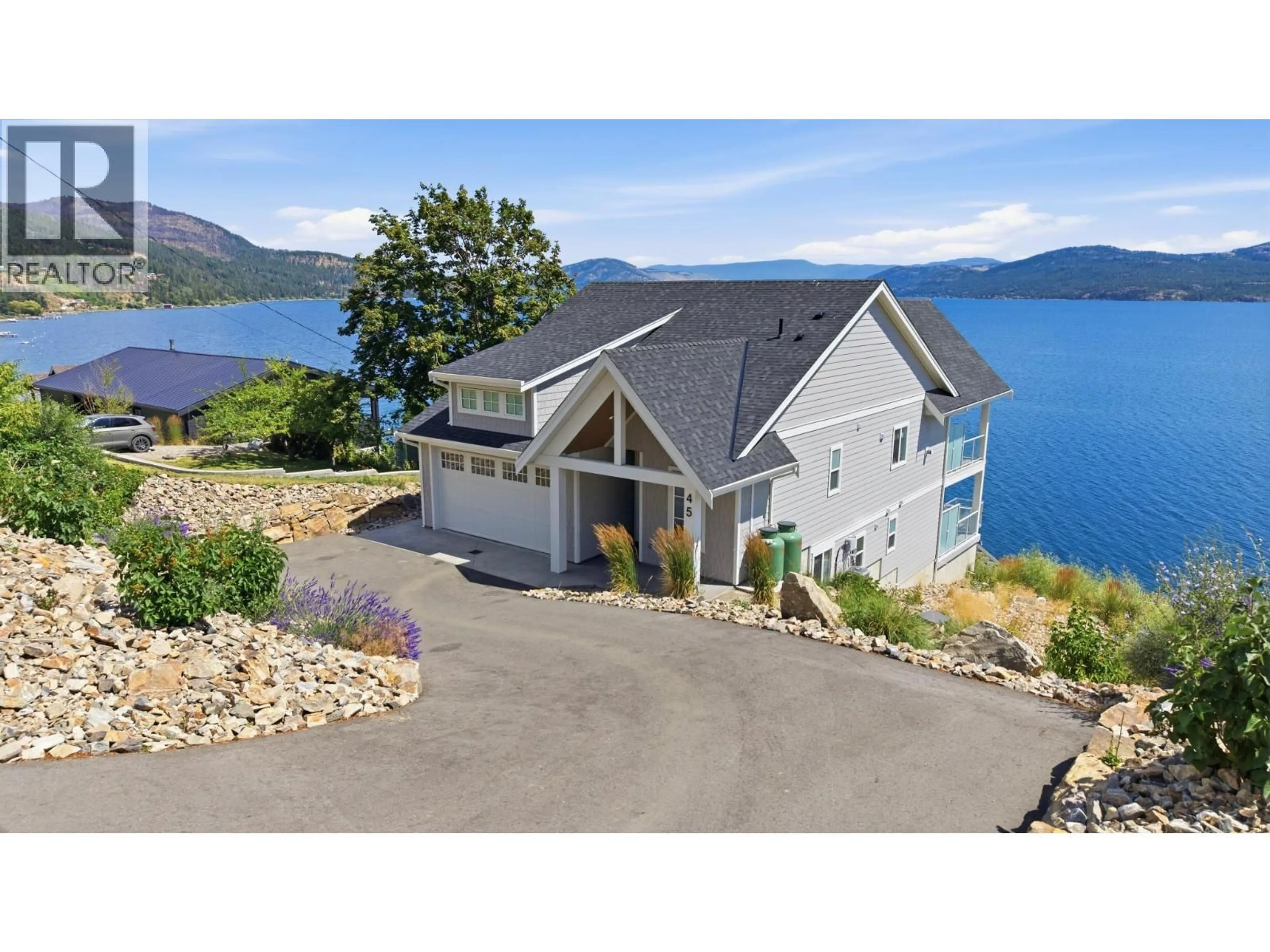 A pic from outside/outdoor area/front of a property/back of a property/a pic from drone, water/lake/river/ocean view for 45 NERIE ROAD, Vernon British Columbia V1H2E4