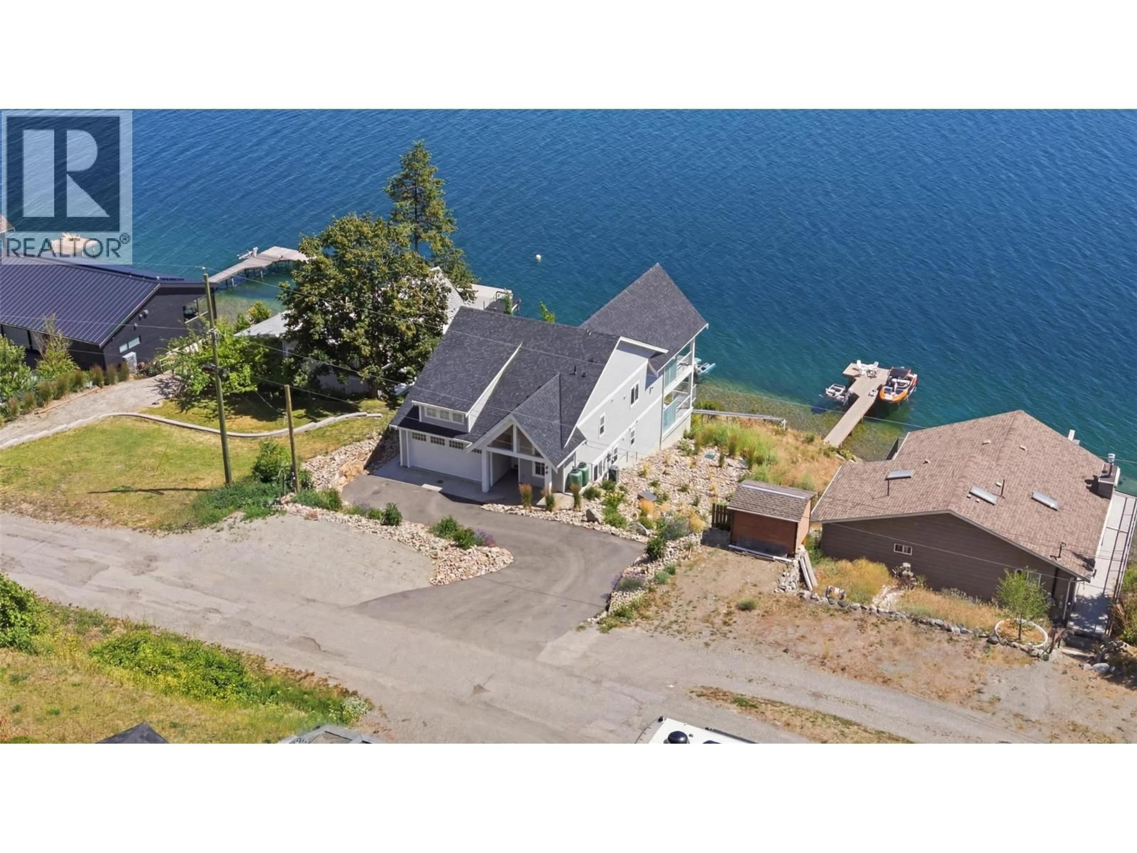 A pic from outside/outdoor area/front of a property/back of a property/a pic from drone, water/lake/river/ocean view for 45 NERIE ROAD, Vernon British Columbia V1H2E4