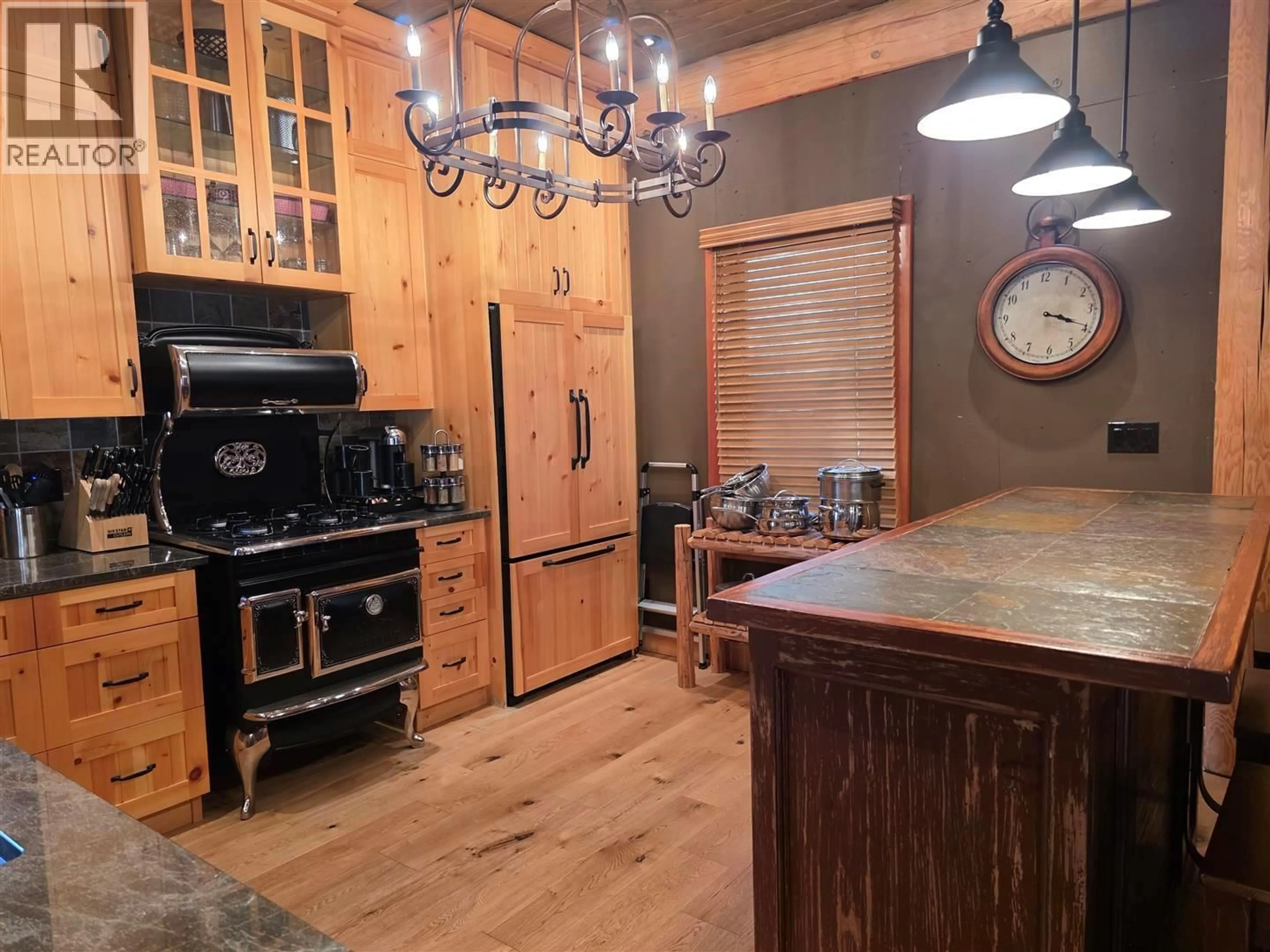 Rustic kitchen, wood/laminate floor for 801 LOON LAKE ROAD, Clinton British Columbia V0K1H1