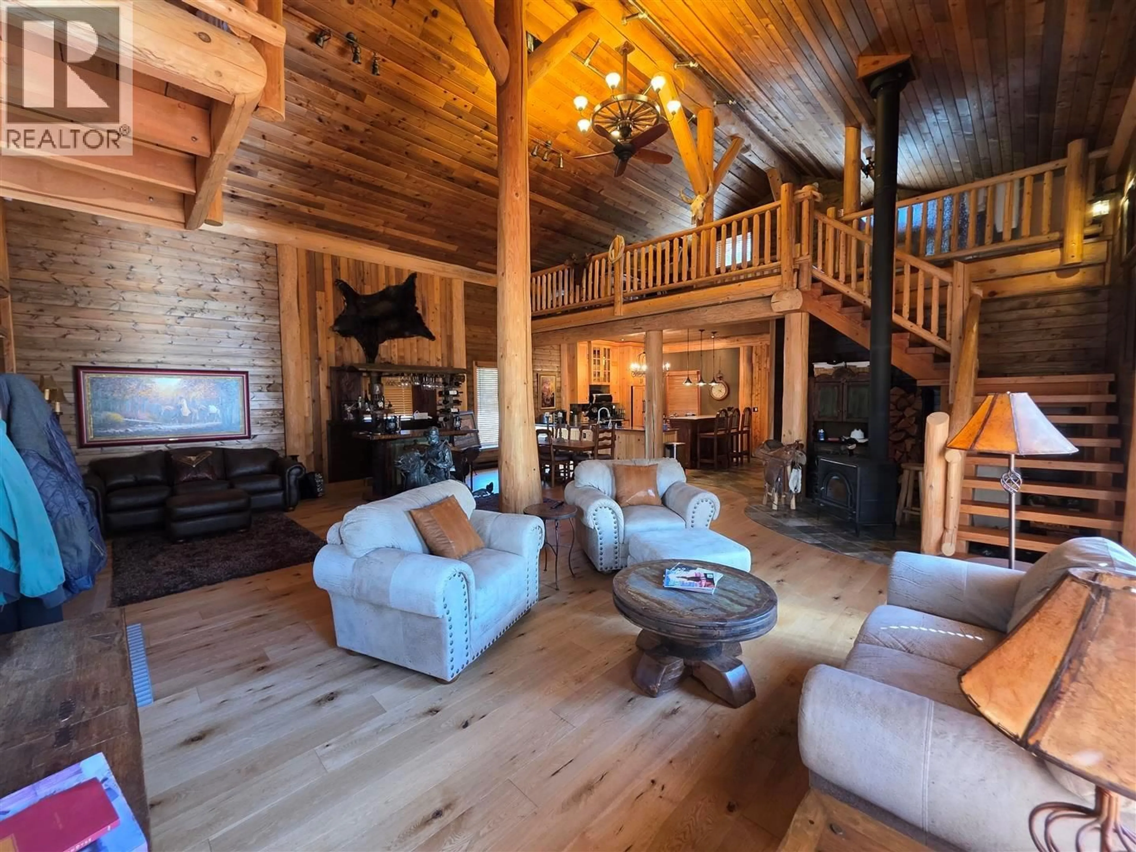 Living room with furniture, wood/laminate floor for 801 LOON LAKE ROAD, Clinton British Columbia V0K1H1