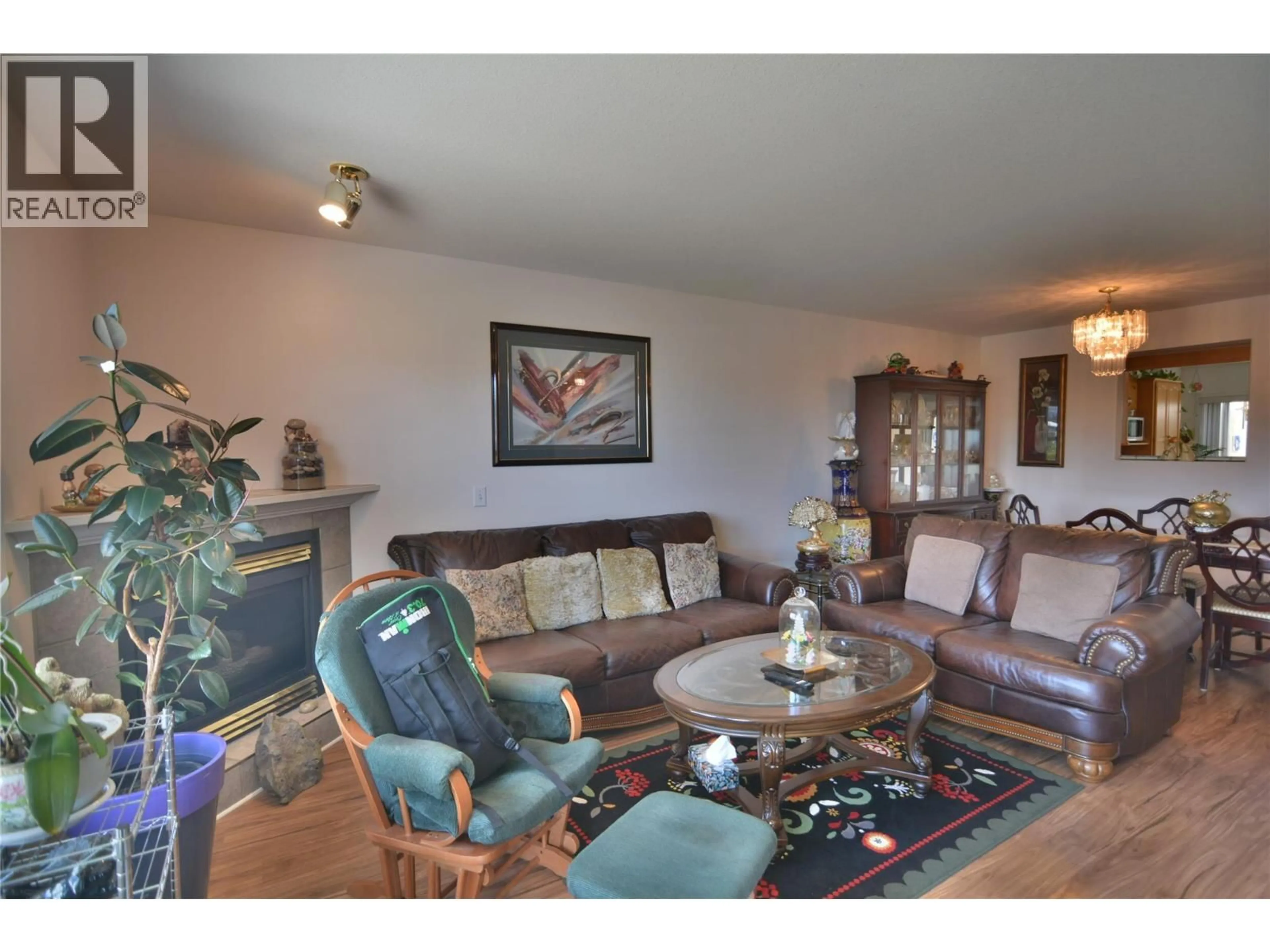 Living room with furniture, wood/laminate floor for 3 - 12612 GIANTS HEAD ROAD, Summerland British Columbia V0H1Z7