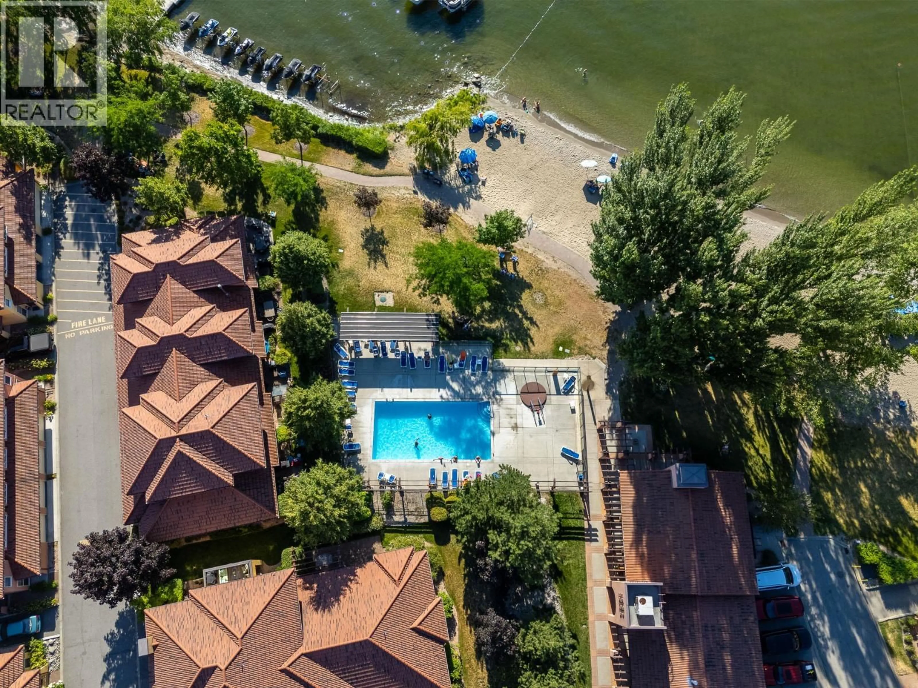 A pic from outside/outdoor area/front of a property/back of a property/a pic from drone, water/lake/river/ocean view for 118 - 7600 COTTONWOOD DRIVE, Osoyoos British Columbia V0H1V3