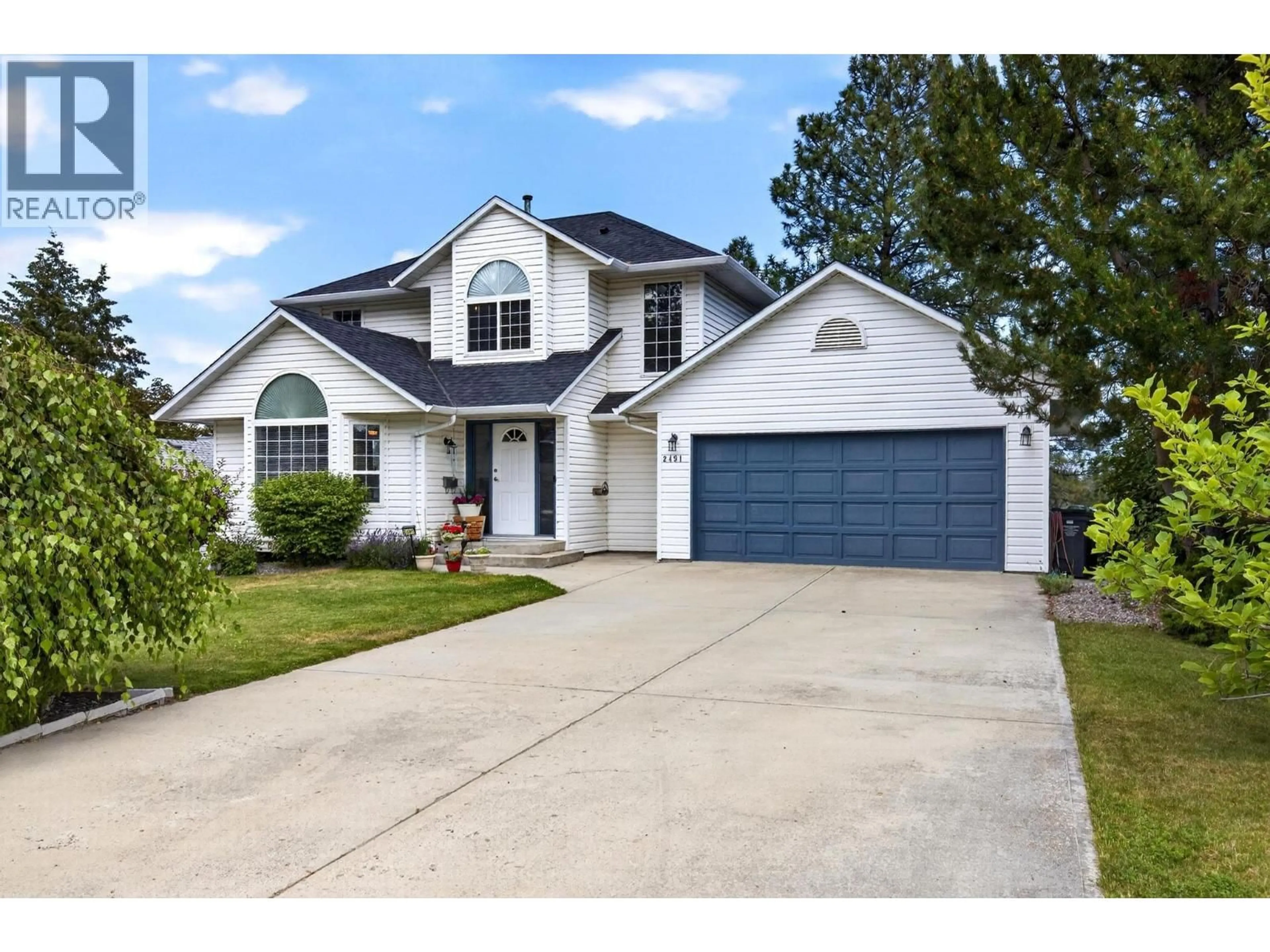 Home with vinyl exterior material, street for 2491 ALEXANDRIA WAY, West Kelowna British Columbia V4T1T7