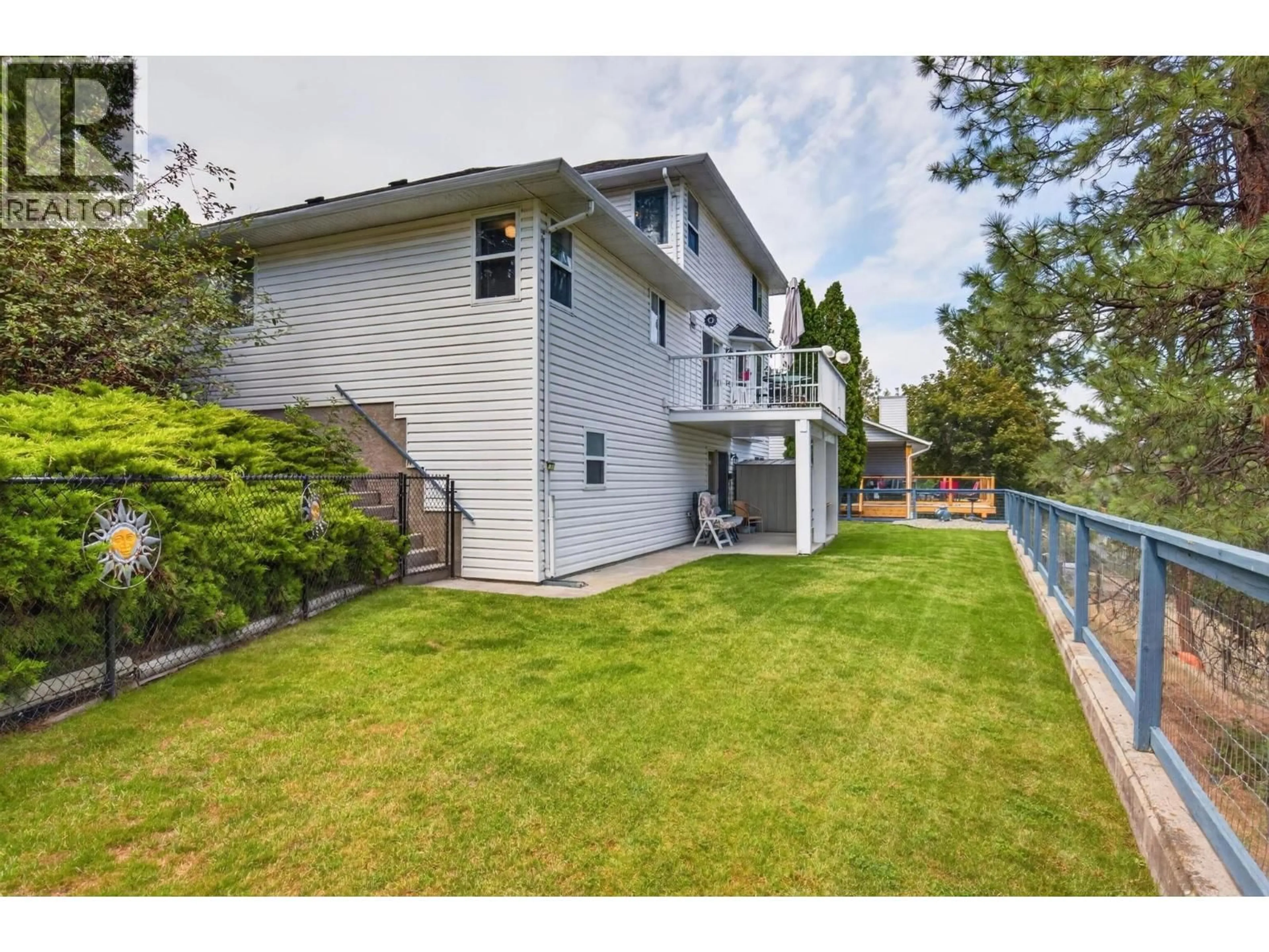 A pic from outside/outdoor area/front of a property/back of a property/a pic from drone, street for 2491 ALEXANDRIA WAY, West Kelowna British Columbia V4T1T7