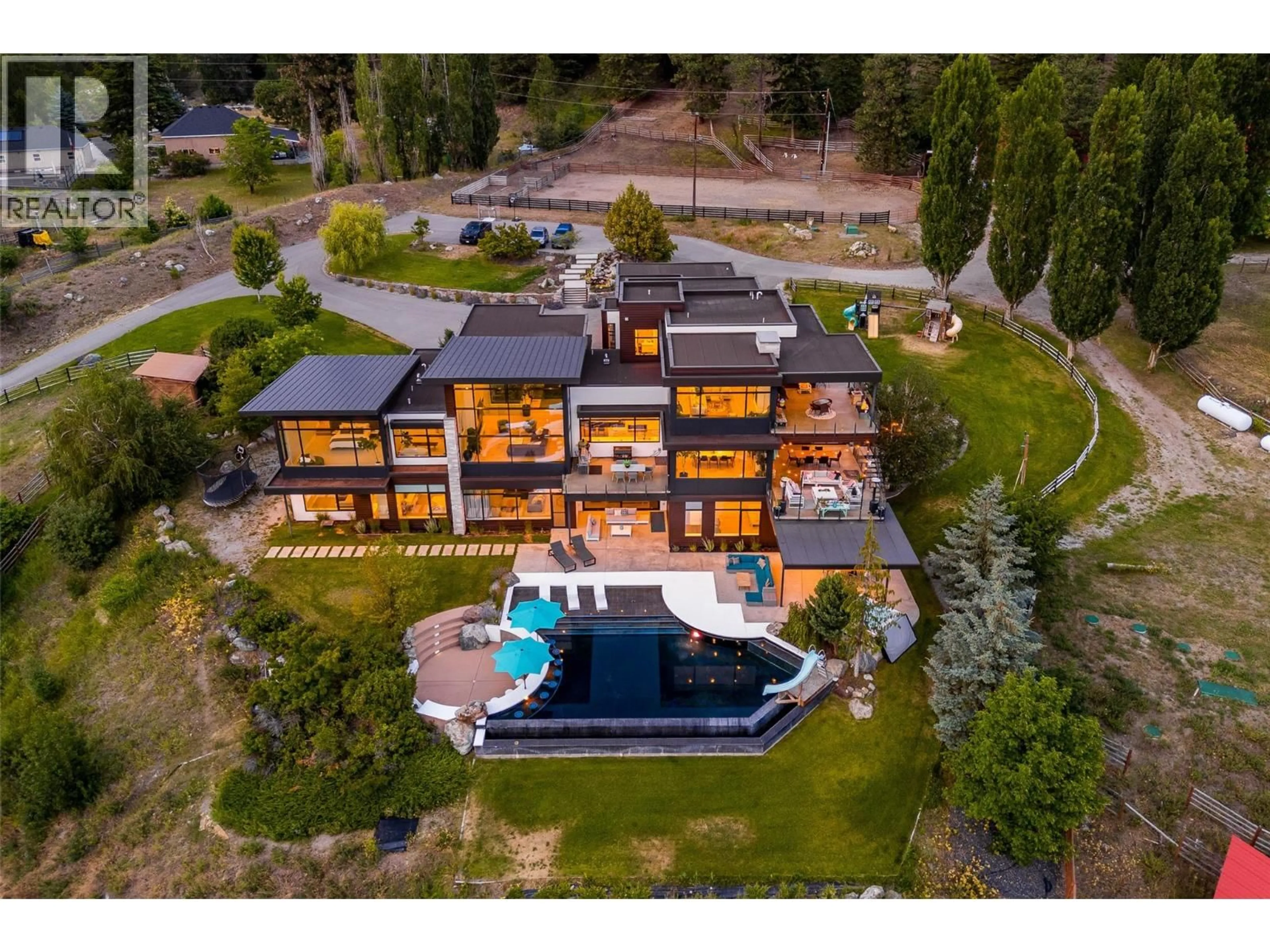A pic from outside/outdoor area/front of a property/back of a property/a pic from drone, mountain view for 4425 TWIN CREEK PLACE, Kelowna British Columbia V1X7V7